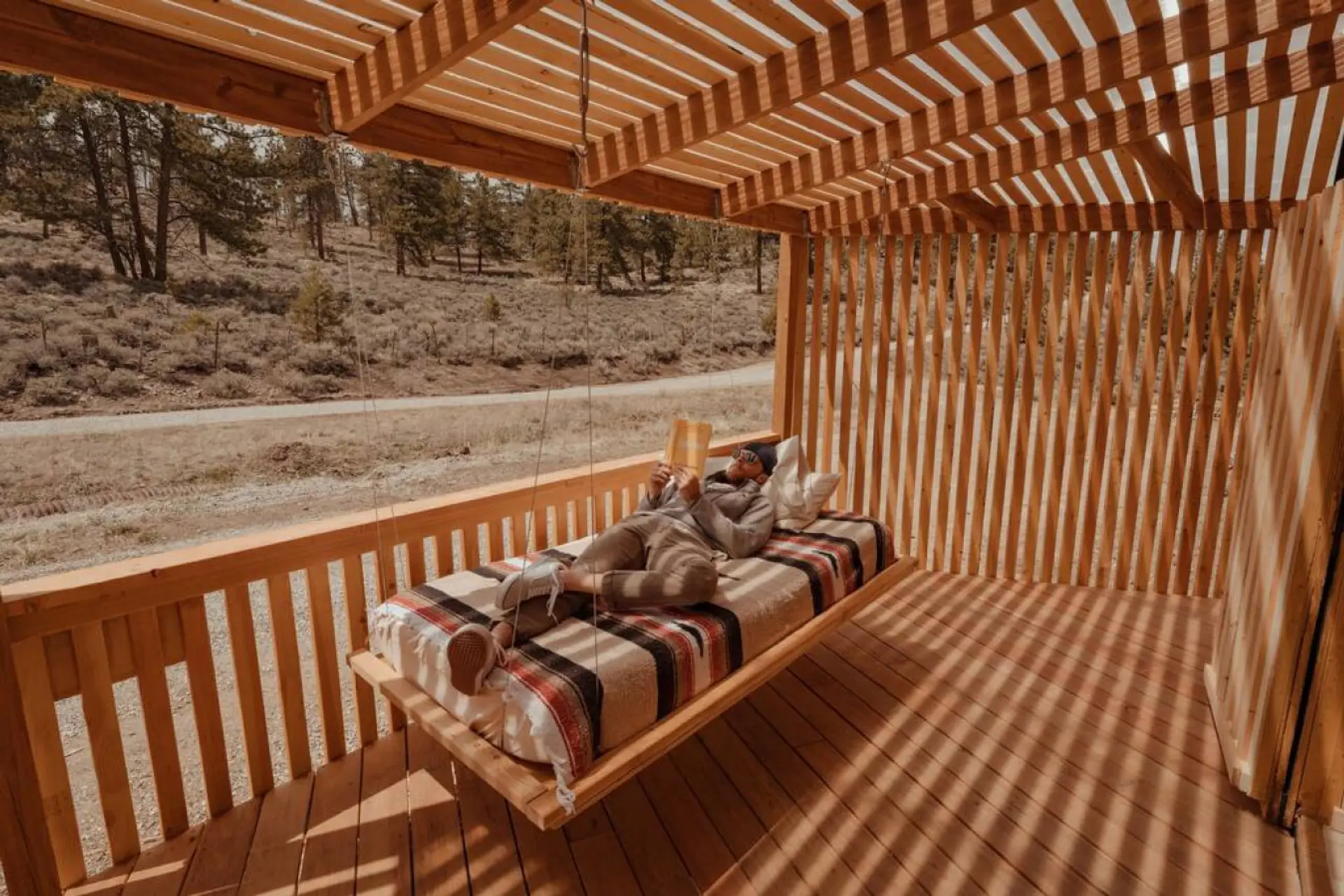 Sun reflections on private outdoor balcony bed
