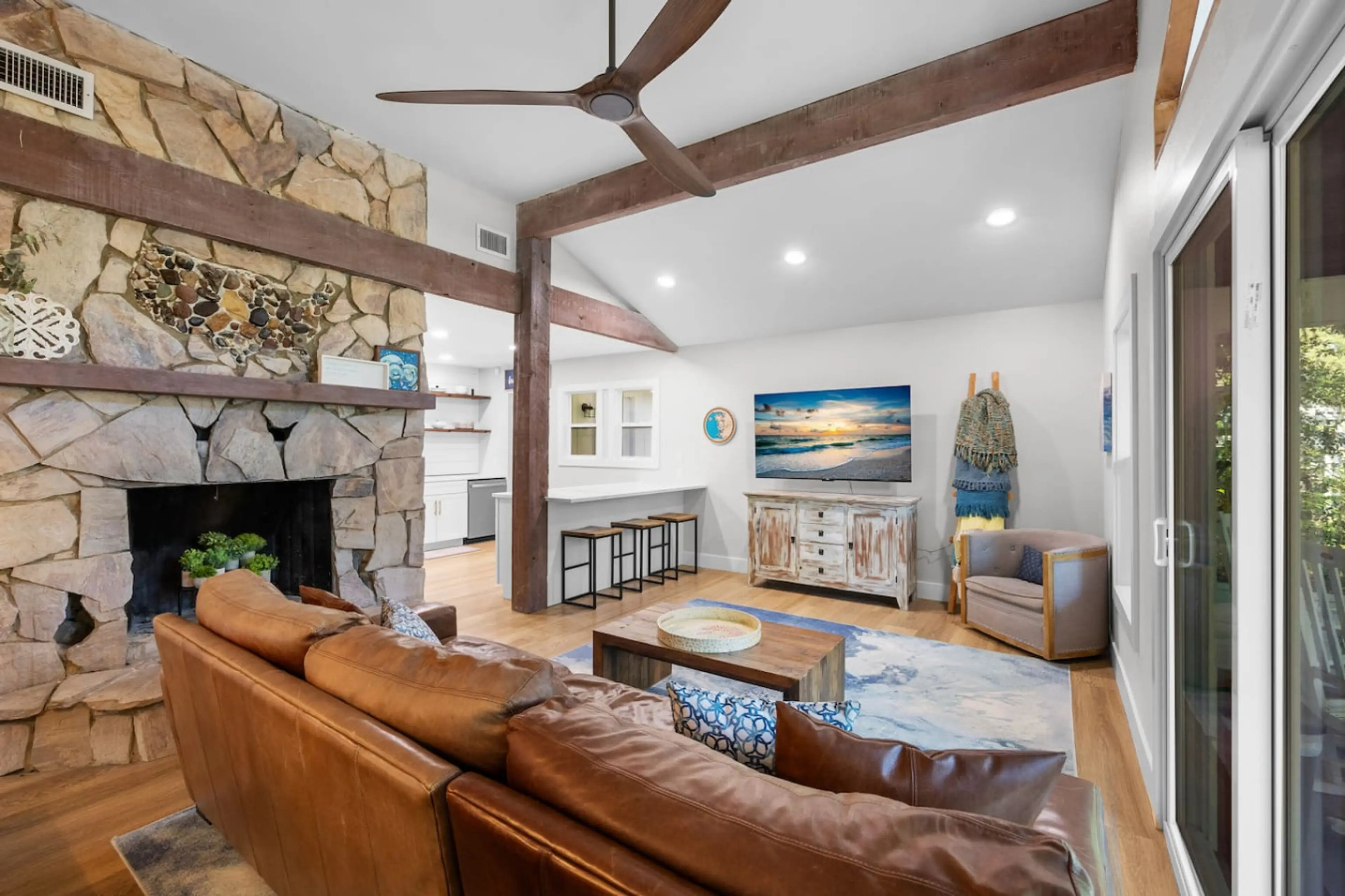 Cozy nights start here  The fireplace adds warmth and ambiance, making this living area just as inviting in cooler months.