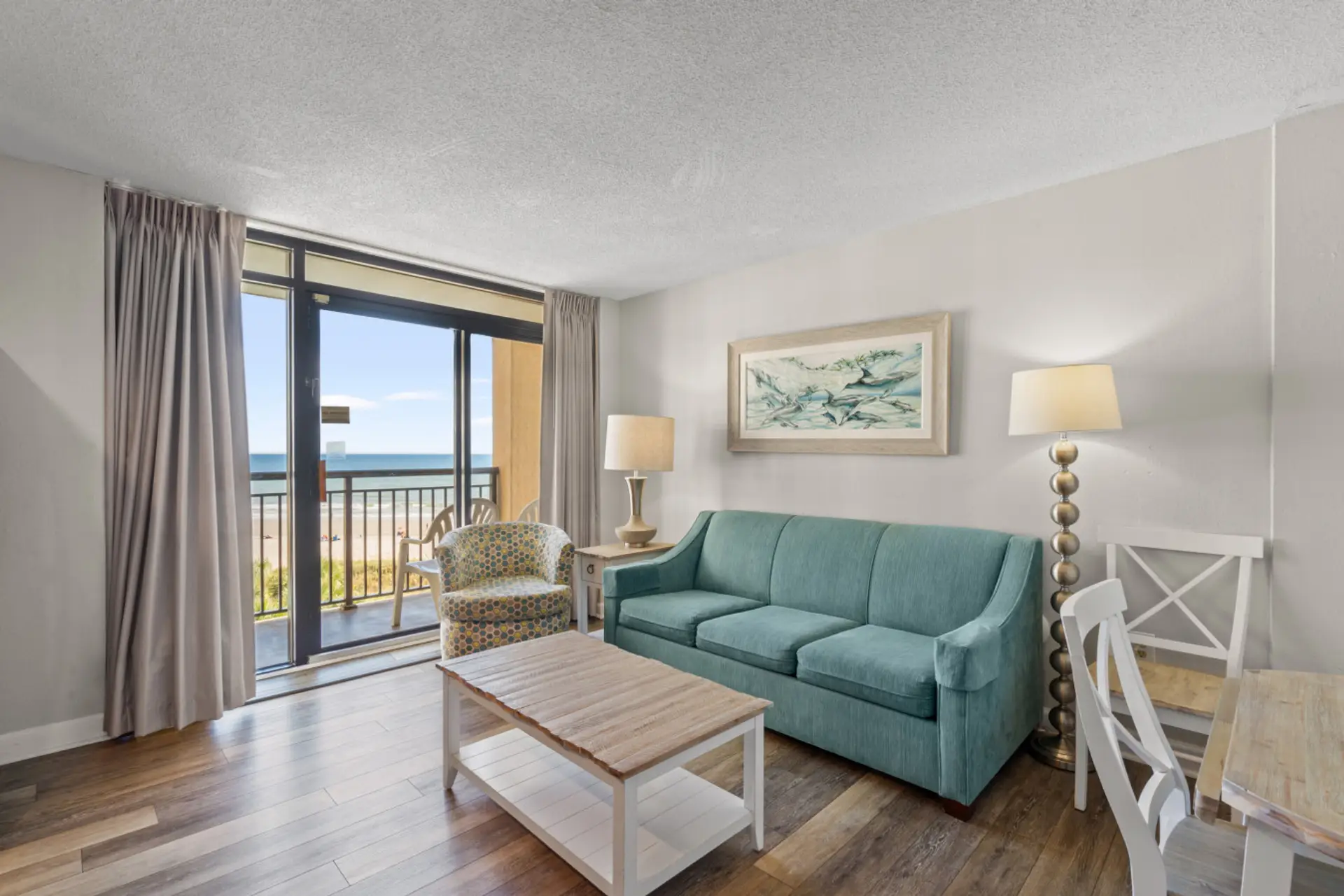 Soak up the sun and ocean breeze from the balcony of this one-bedroom condo at Beach Cove Resort.