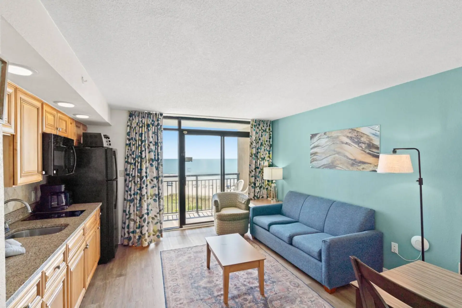 Sink into the queen sleeper sofa in this oceanfront condo, opening onto a private balcony with sweeping views.