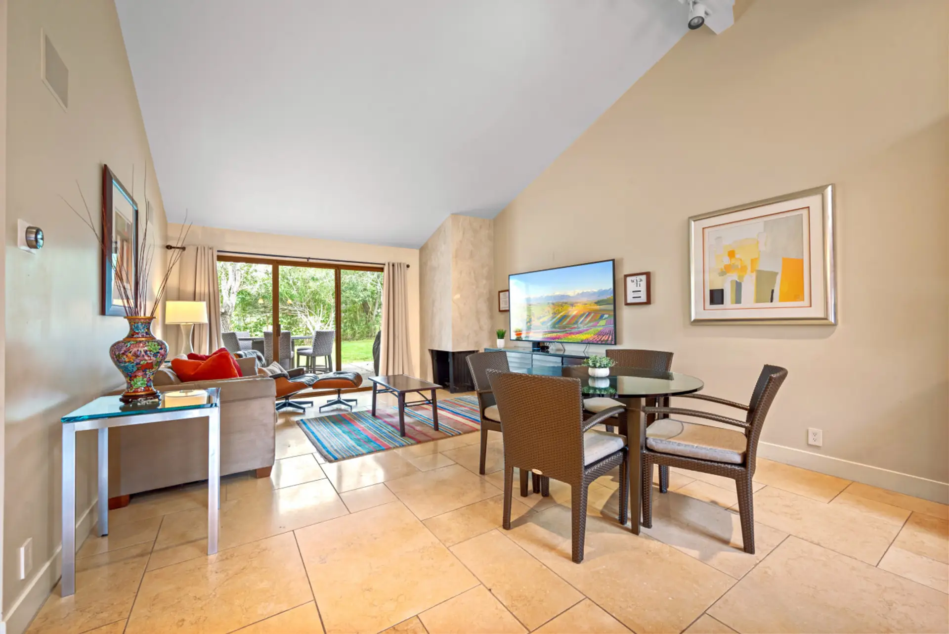 Open floor plan for kitchen and living room. New kitchen supplies, fully stocked! New 75 inch smart TV.  Golf views out rear patio