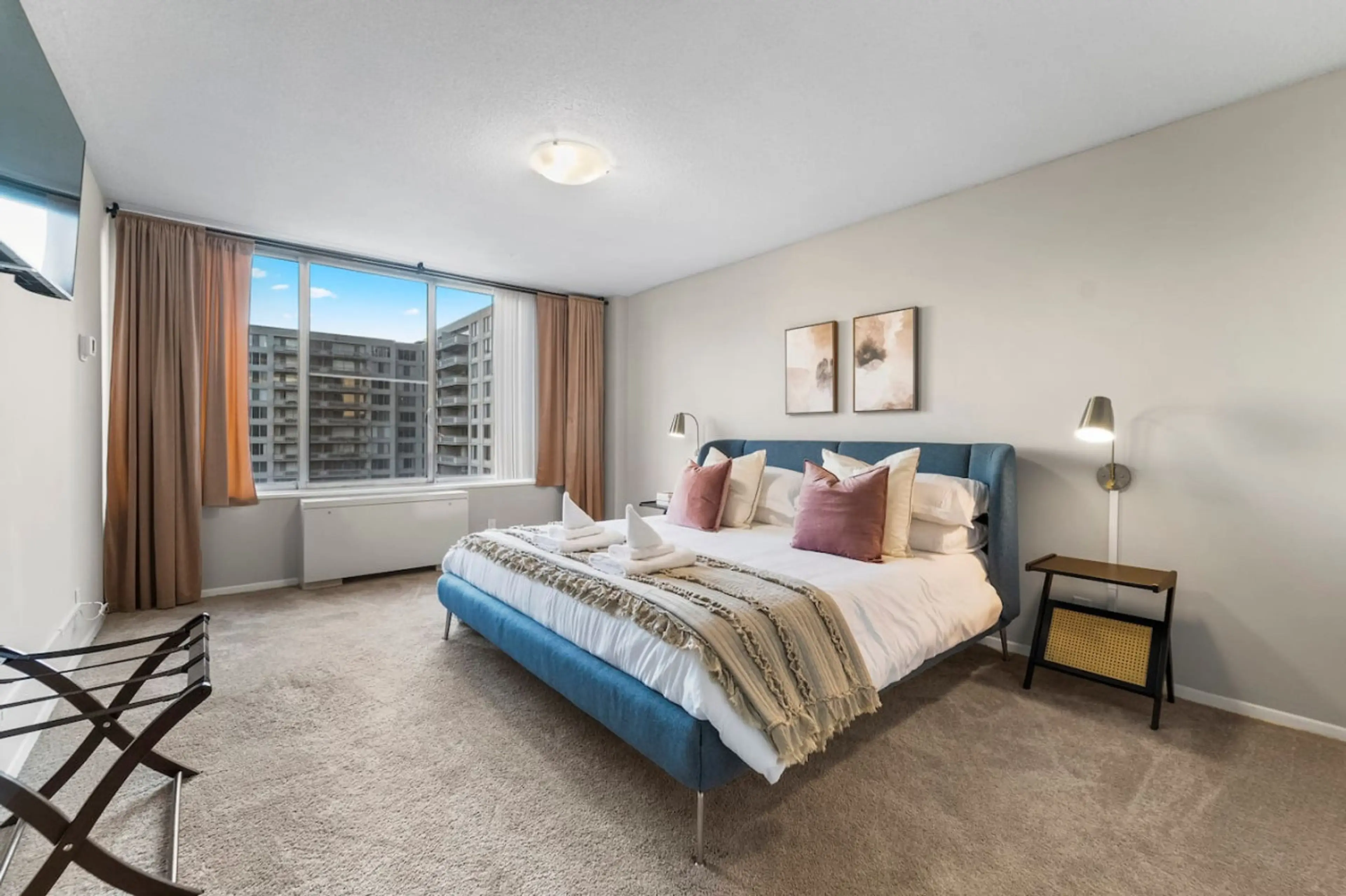 Step into this cozy KING bedroom, with memory foam mattress, where plush pillows and a soft, inviting blanket await you. Imagine yourself sinking into the bed after a long day, surrounded by layers of comfort that make it easy to drift off to sleep.