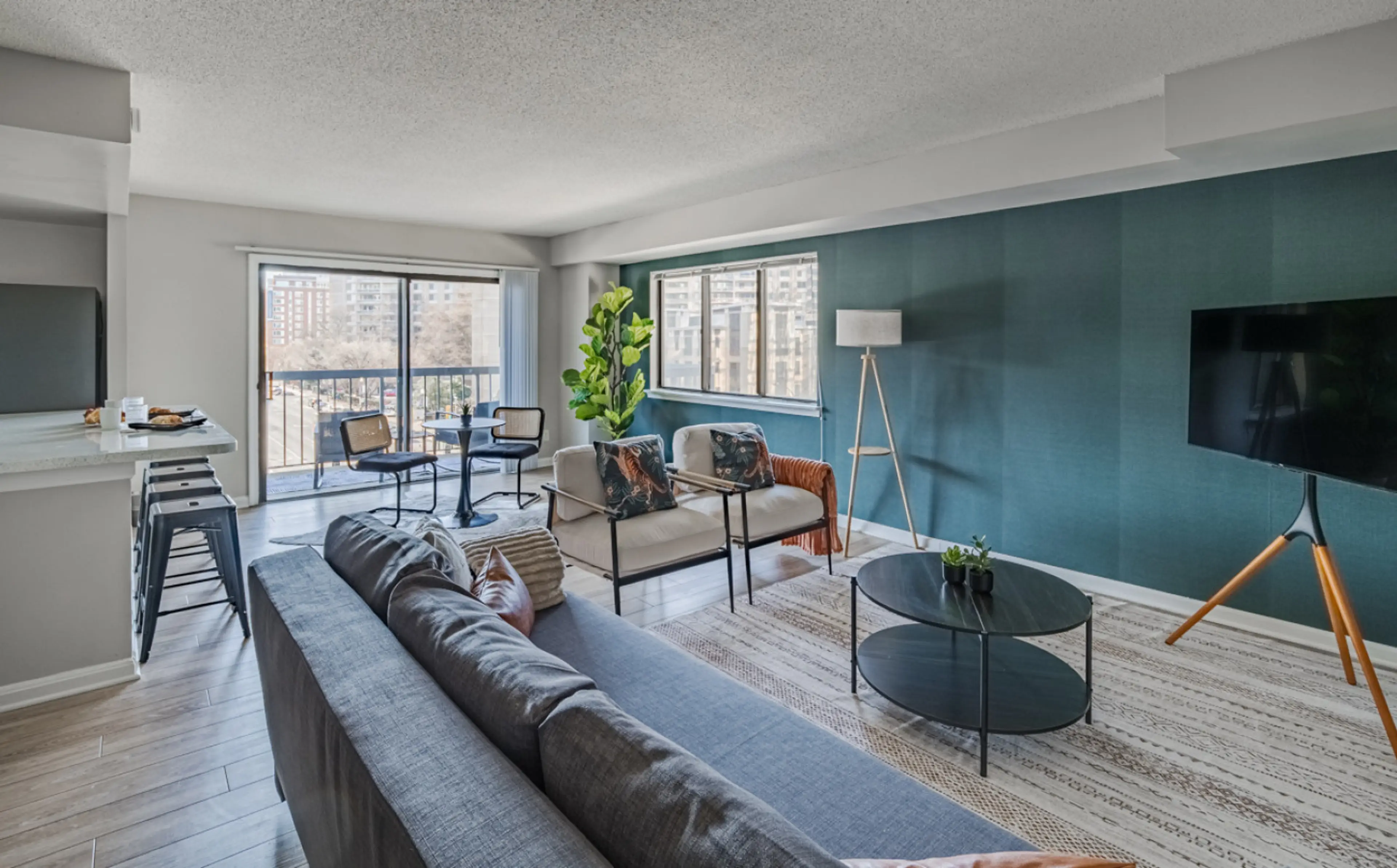 Imagine unwinding here after a busy day of sightseeing. You can kick back on the comfy sofa, turn on the TV, and enjoy some quiet time in this welcoming living room.
