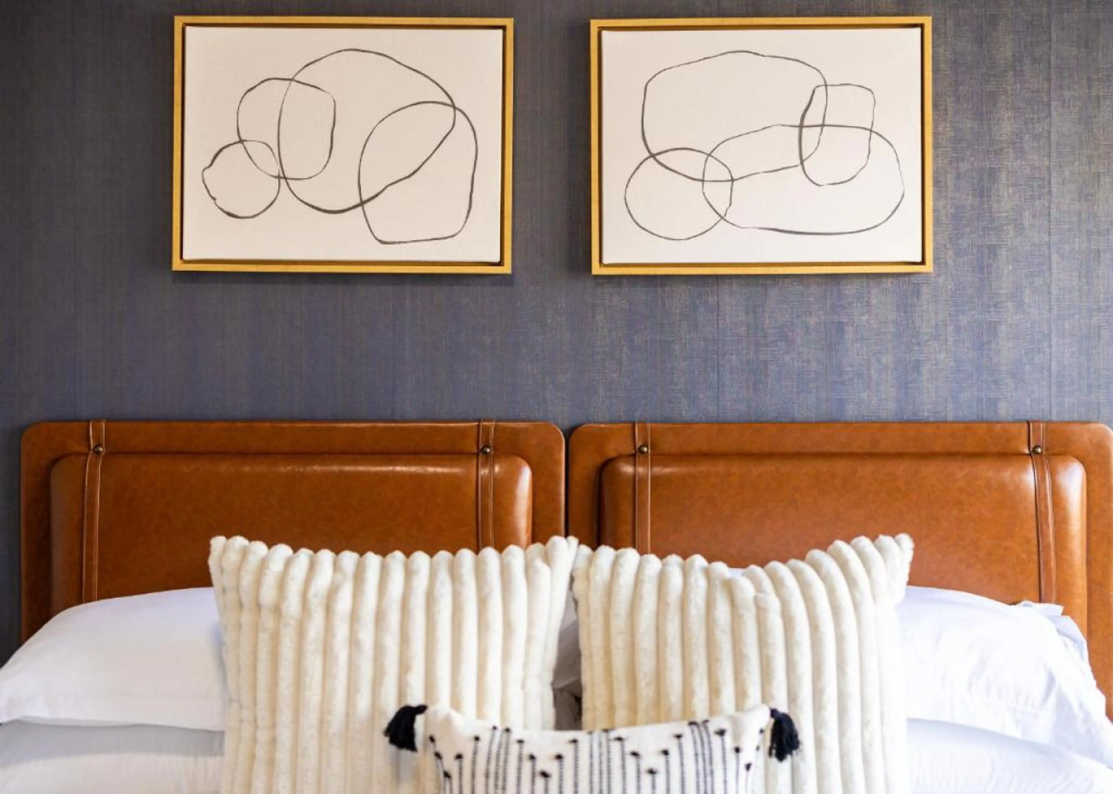 You’ll love the versatility of this room, with a plush king bed for restful nights or a cozy retreat, complete with 40" smart tv (not pictured).