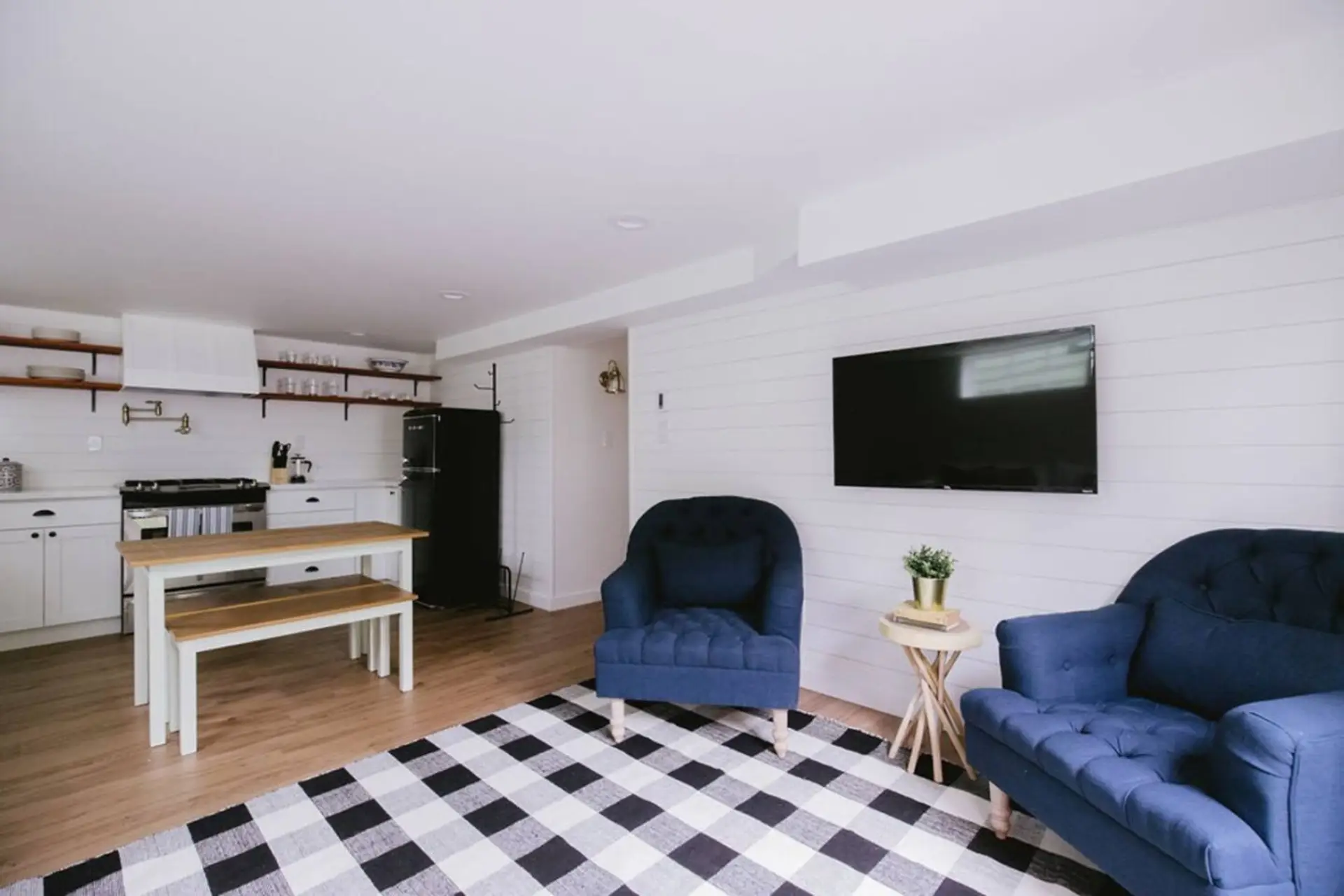Spacious living room, dining area and fully stocked kitchen.