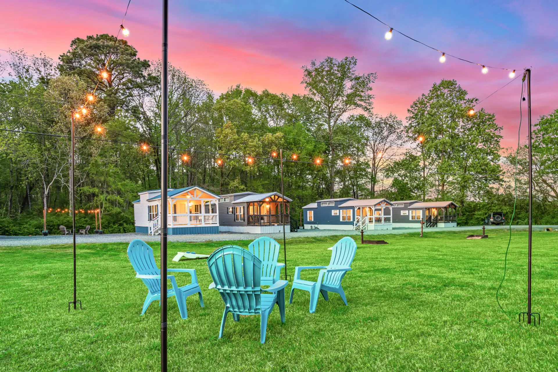 Unwind under the string lights after a full lake day with open space, fresh air, and quiet evenings by the fire.