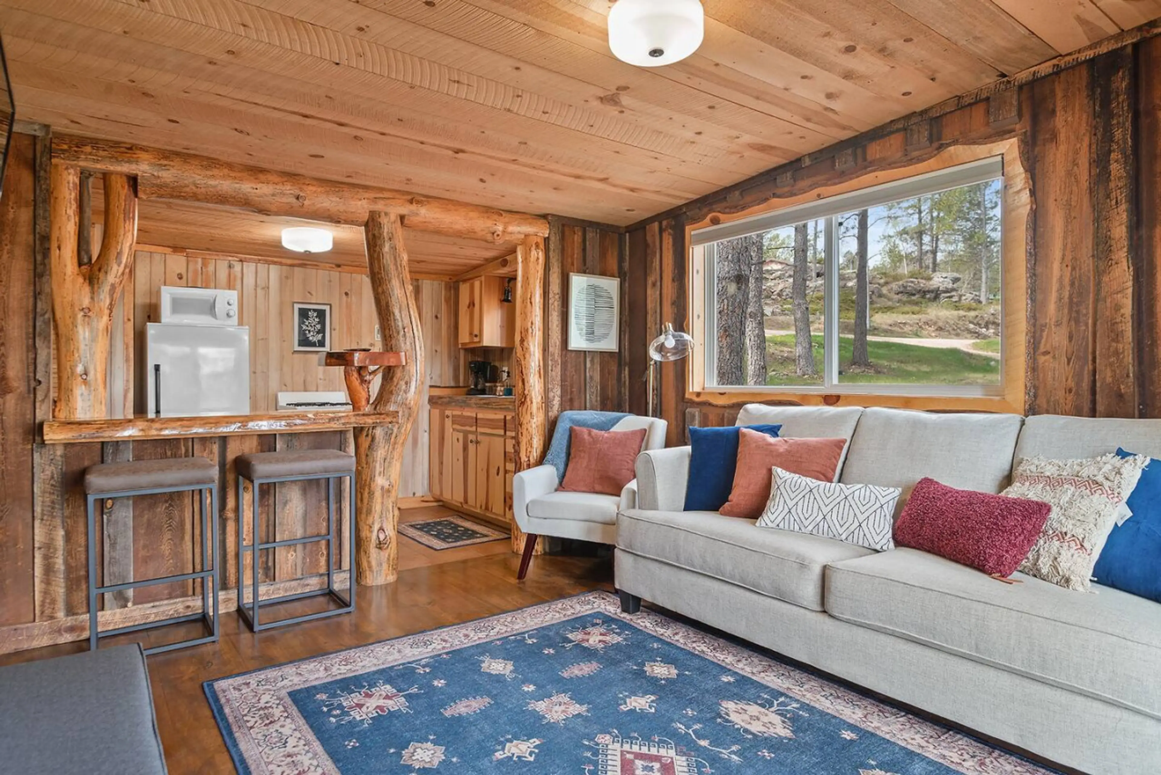 Living room with great view of Cathedral Spires, nicely decorated and modern cabin!
