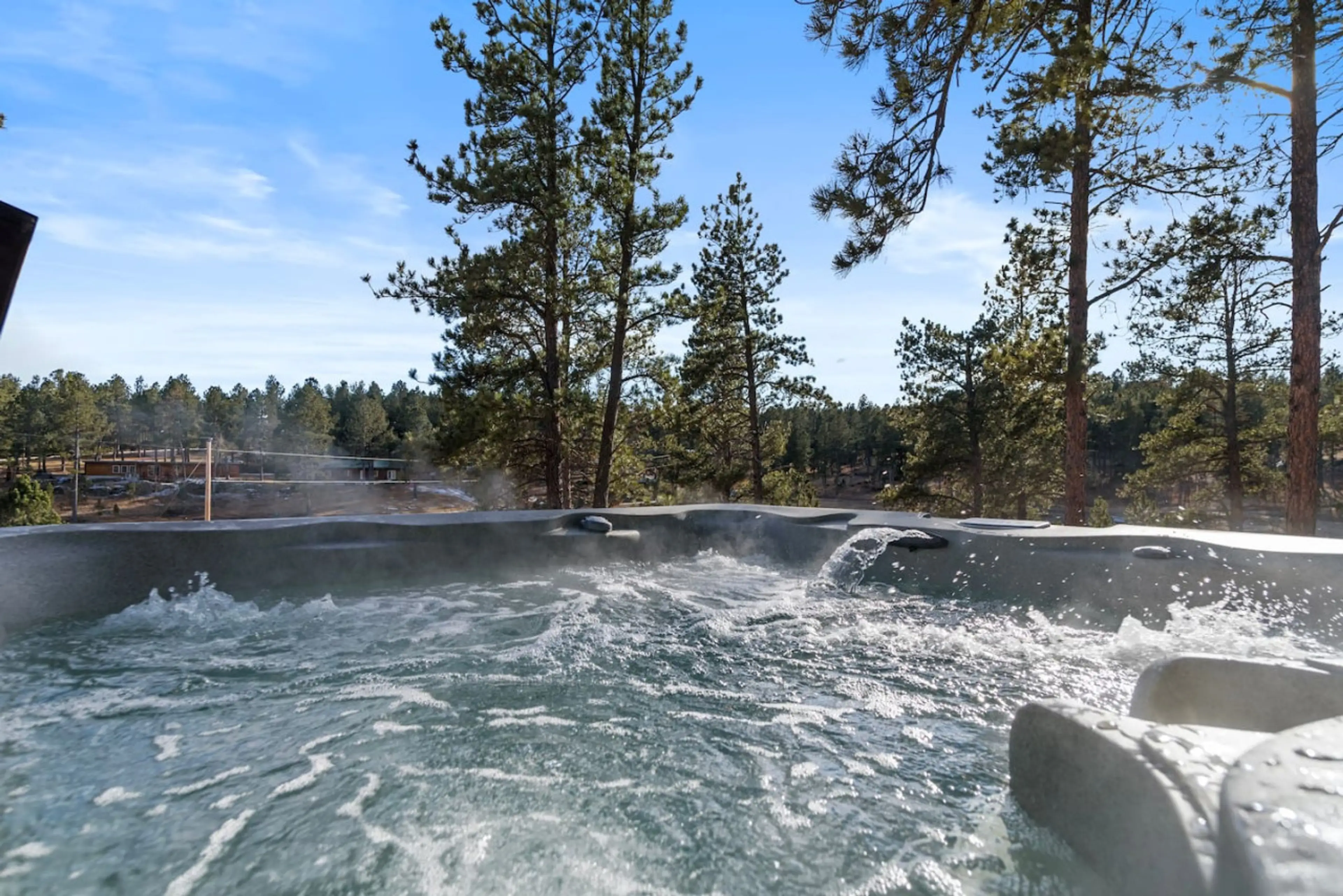 Unwind and rejuvenate in the privacy of your own hot tub oasis