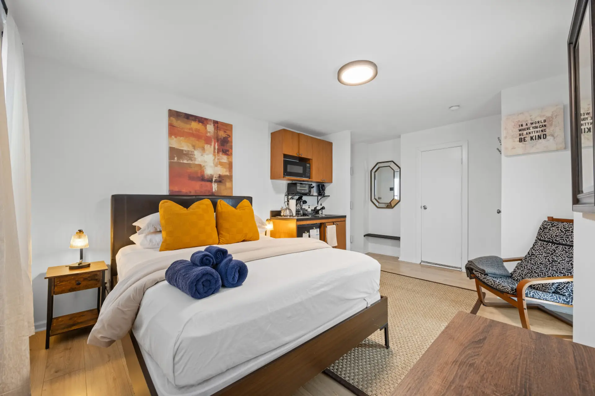 A cozy double bed with plush linens, sleeps 2
