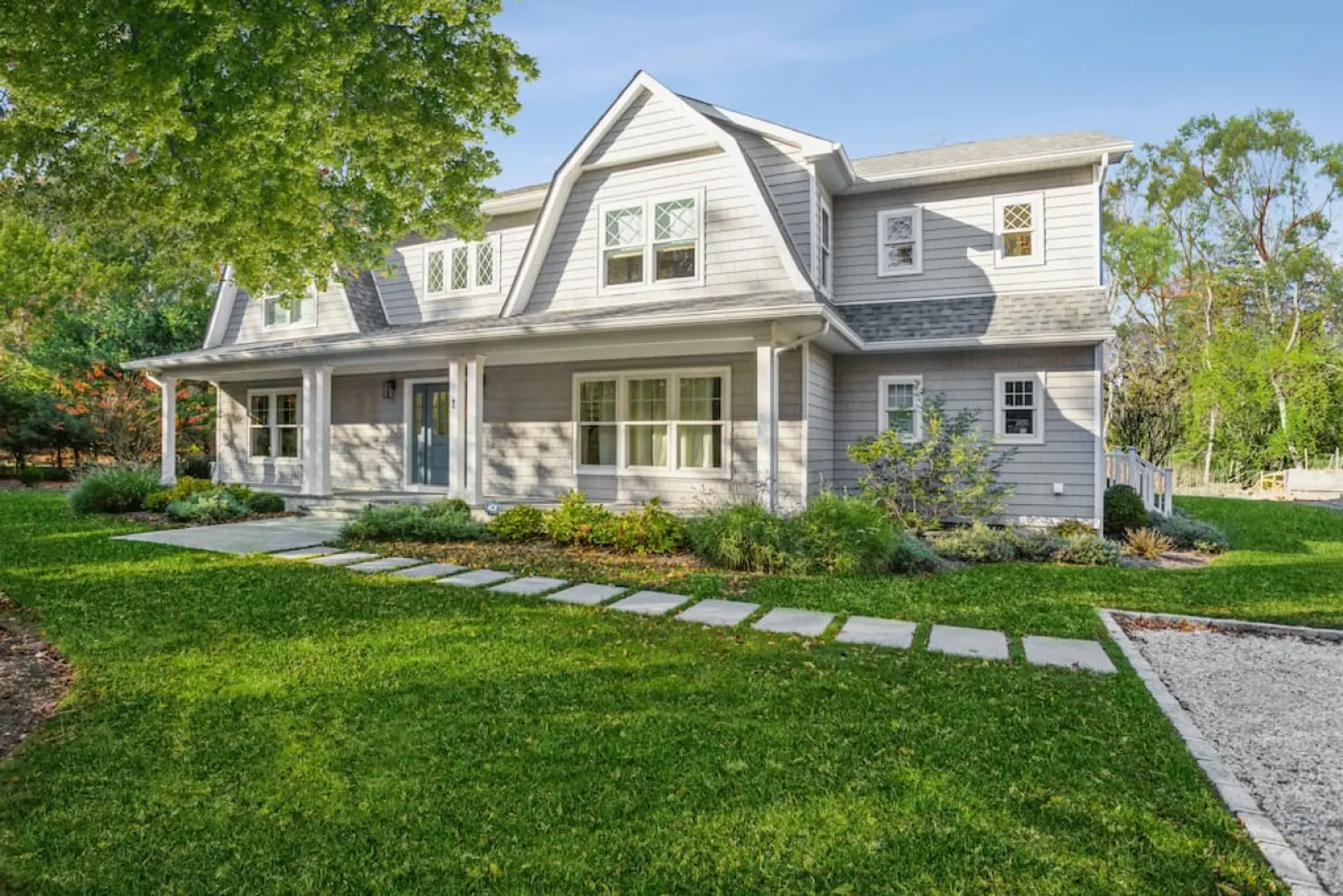 The outside view of the house with 6 bedrooms and 6 bathrooms.