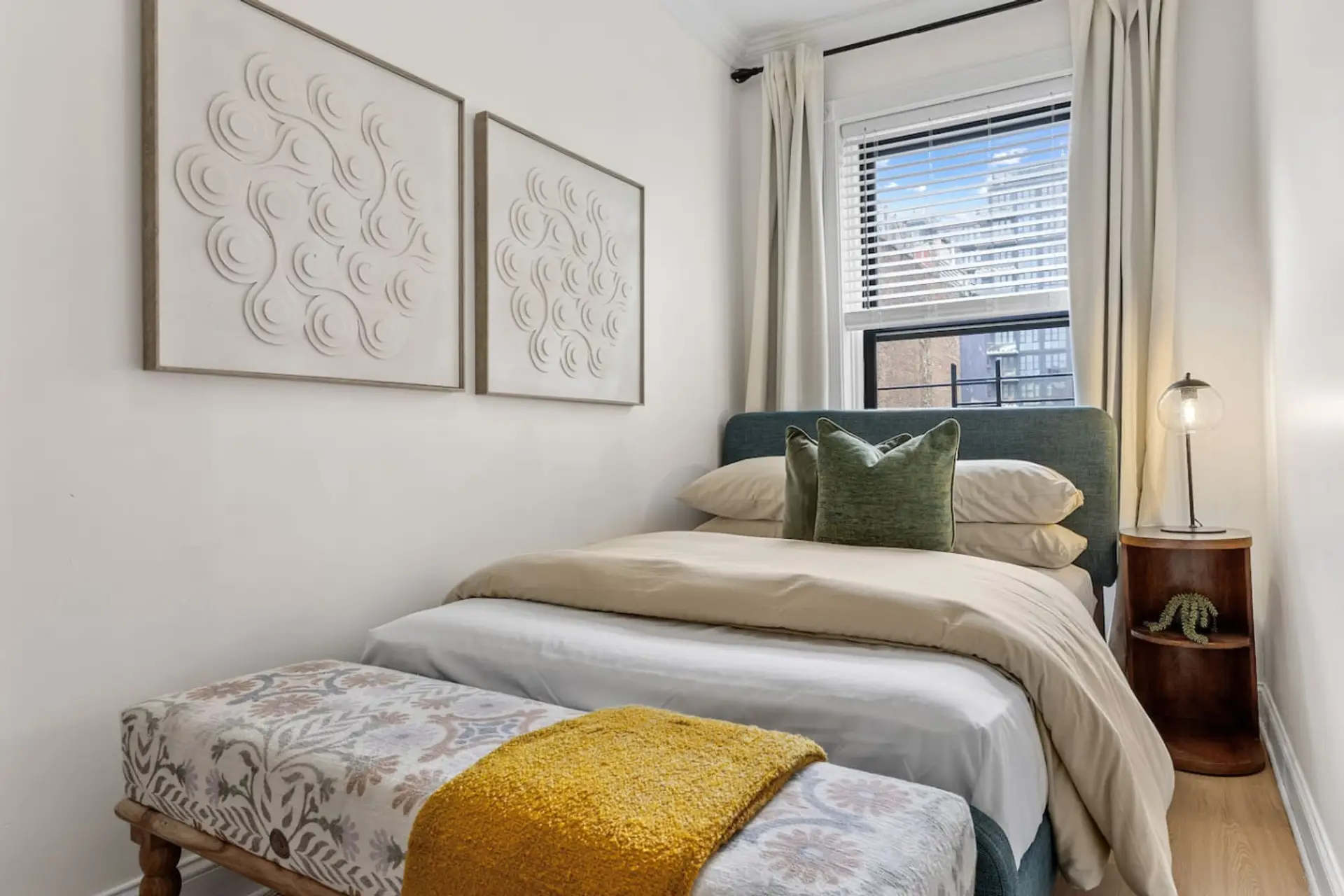 Enjoy a peaceful night's sleep in this calming bedroom. Wake up refreshed and ready to explore!