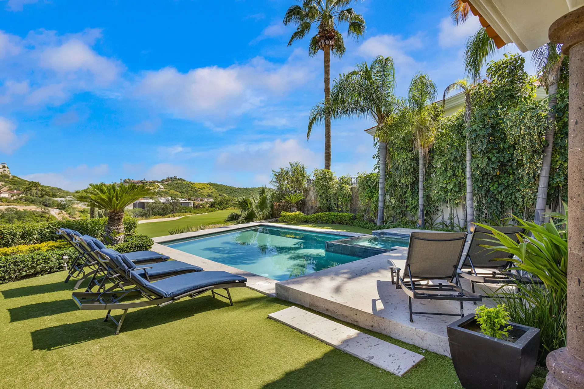 Jacuzzi and lawn with golf course view