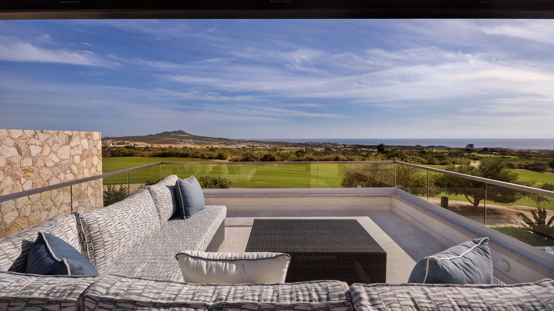 Rooftop lounge with golf and ocean view