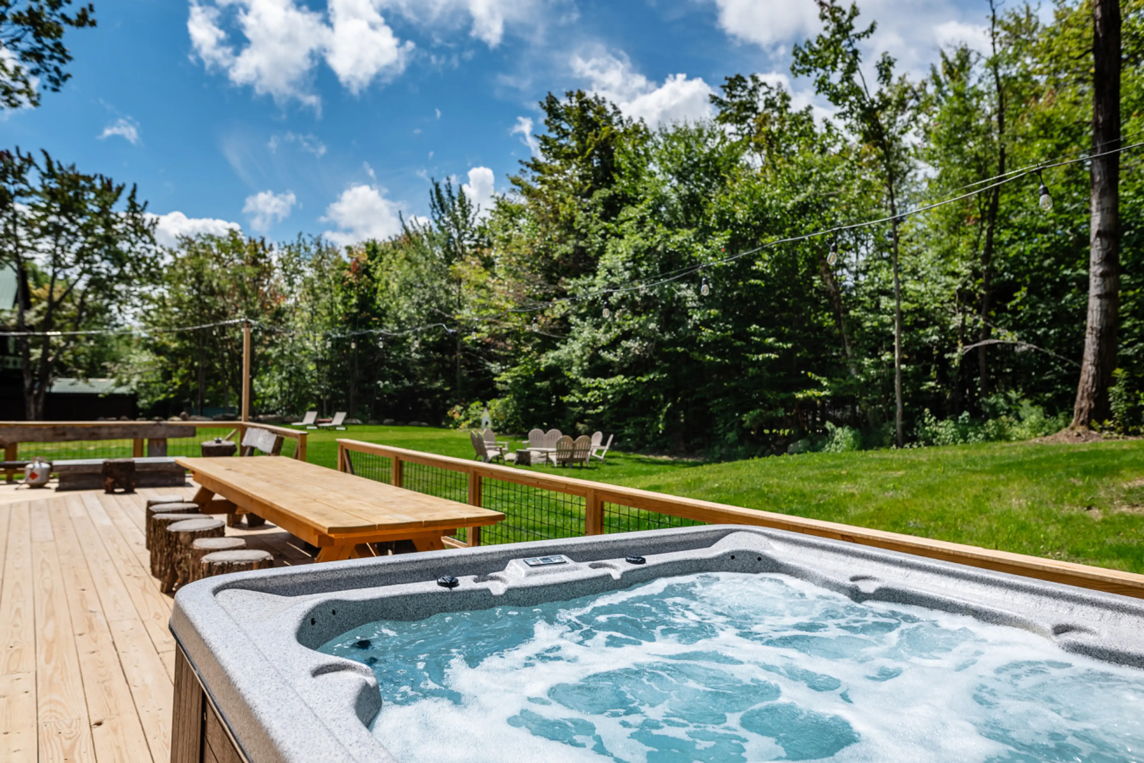 Private hot tub surrounded by nature—your ultimate relaxation spot.