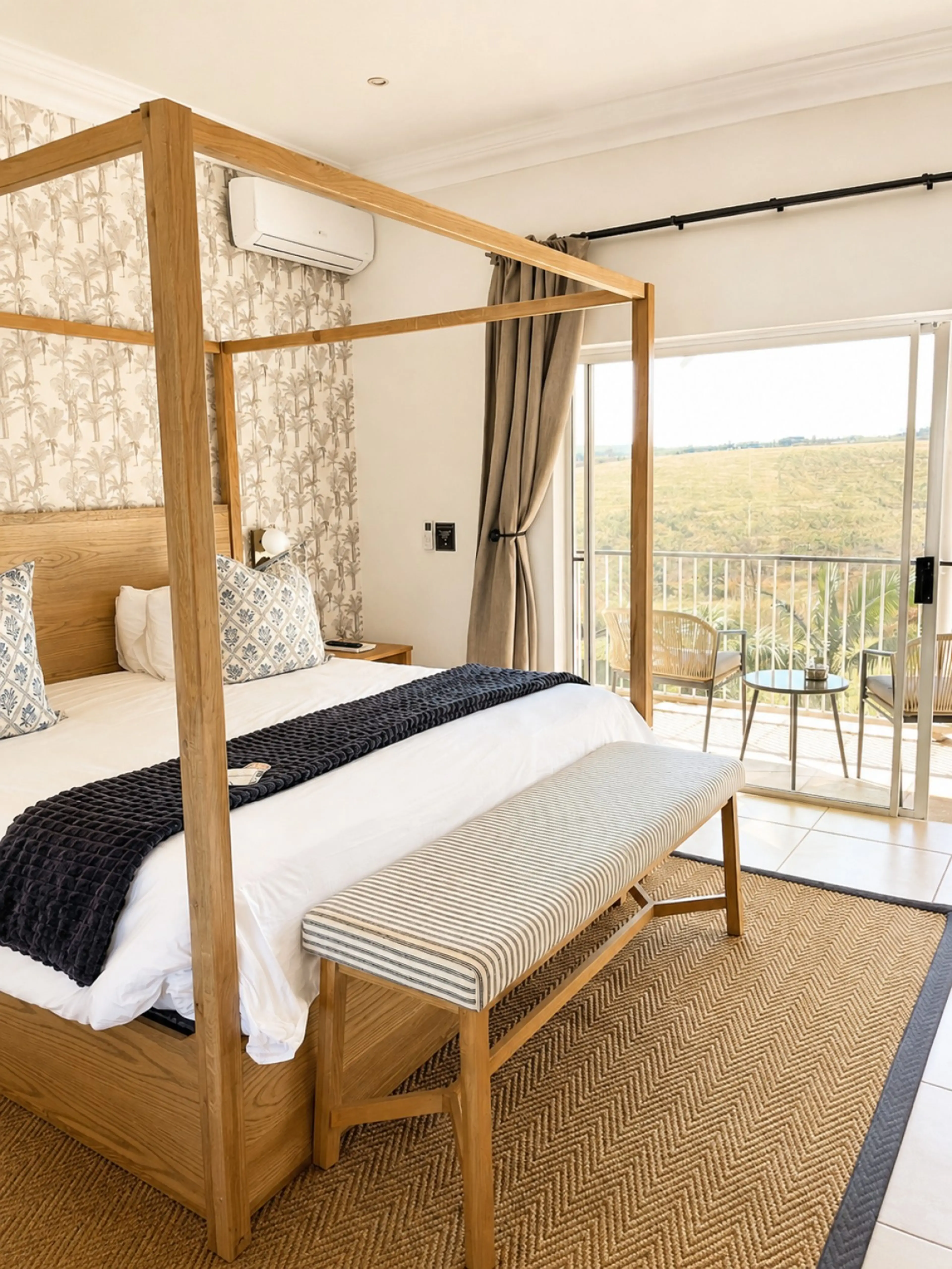 King sized bed with private balcony & mountain view