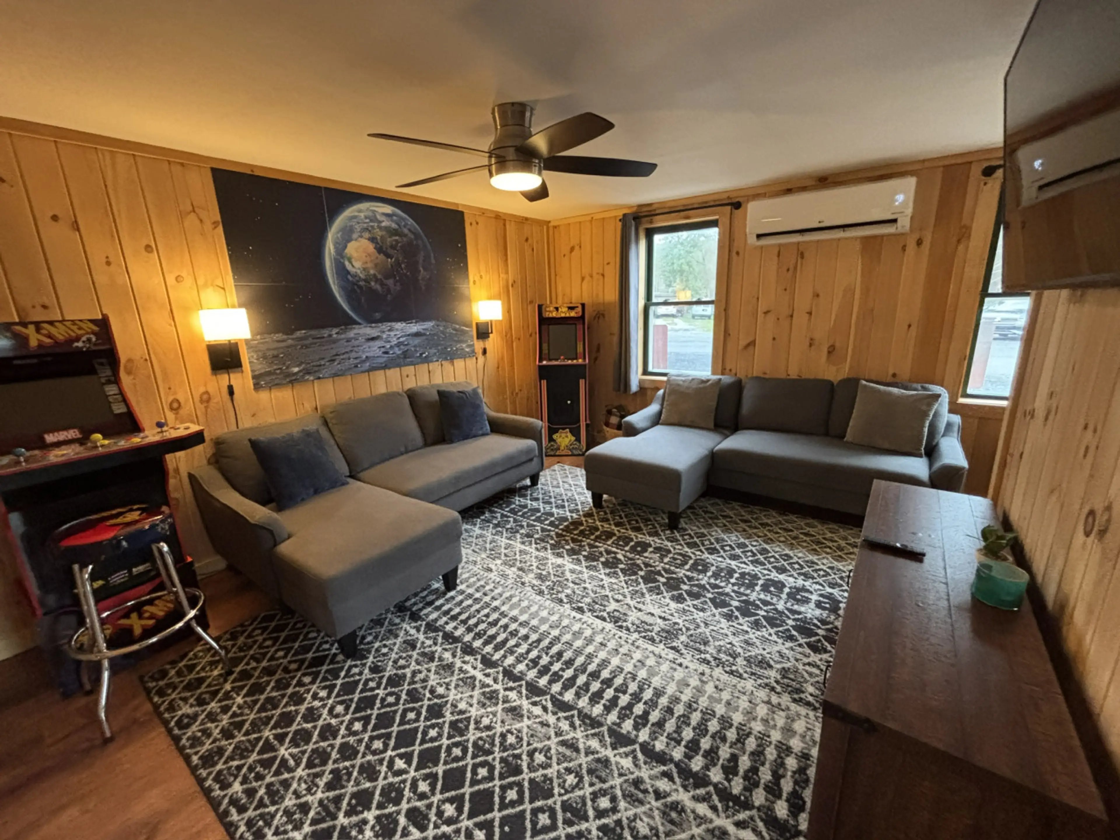 Apt 1: Living room with (x2) sleeper sofas + (x2) full size arcade games!