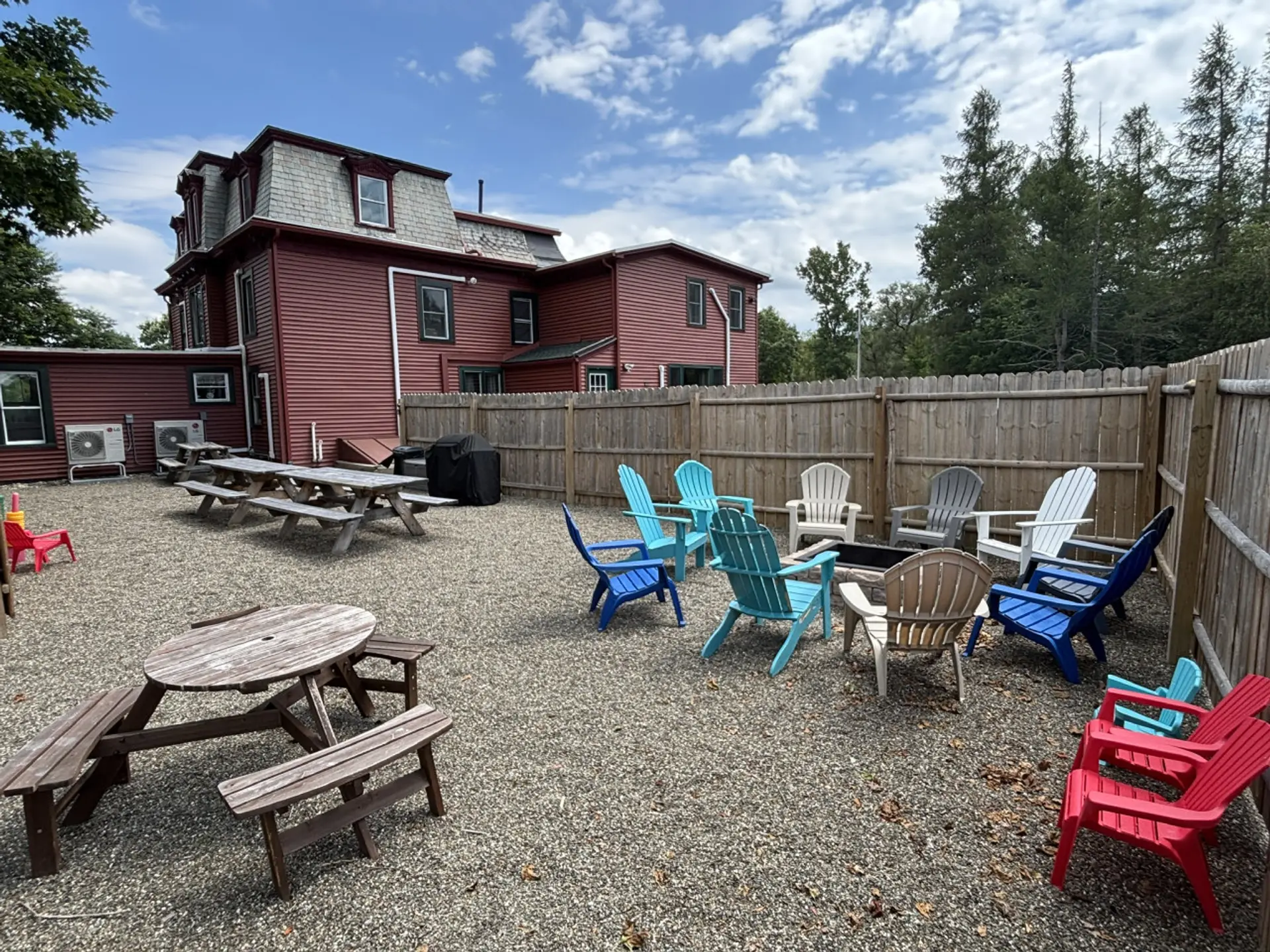 1 of 2 outdoor amenity spaces! We have 2 firepits, BBQs, Adirondack chairs, fire starter, fire wood, games and more!