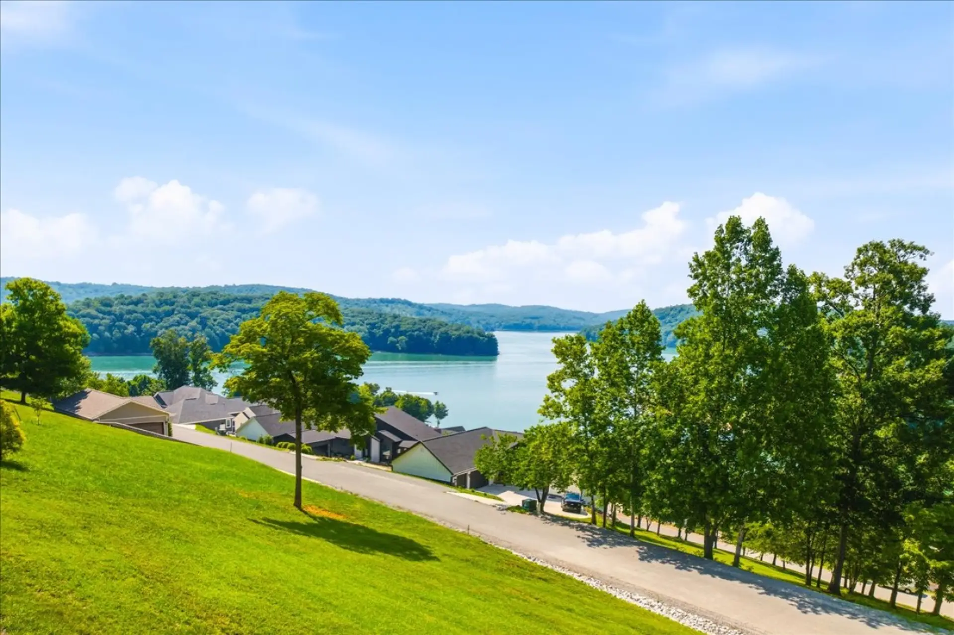 Relax on the back decks with sweeping views of the lake