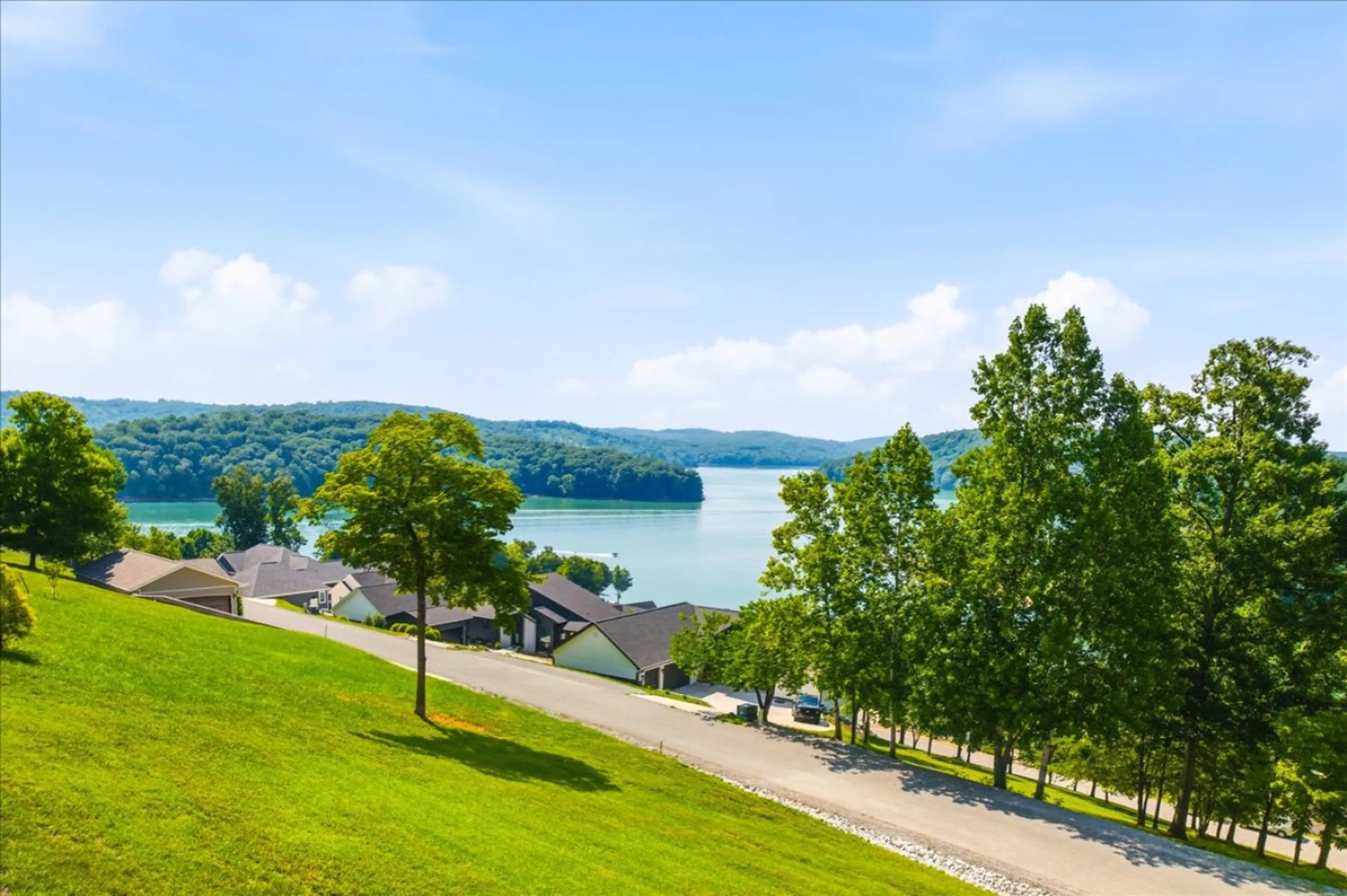 Relax on the back decks with sweeping views of the lake