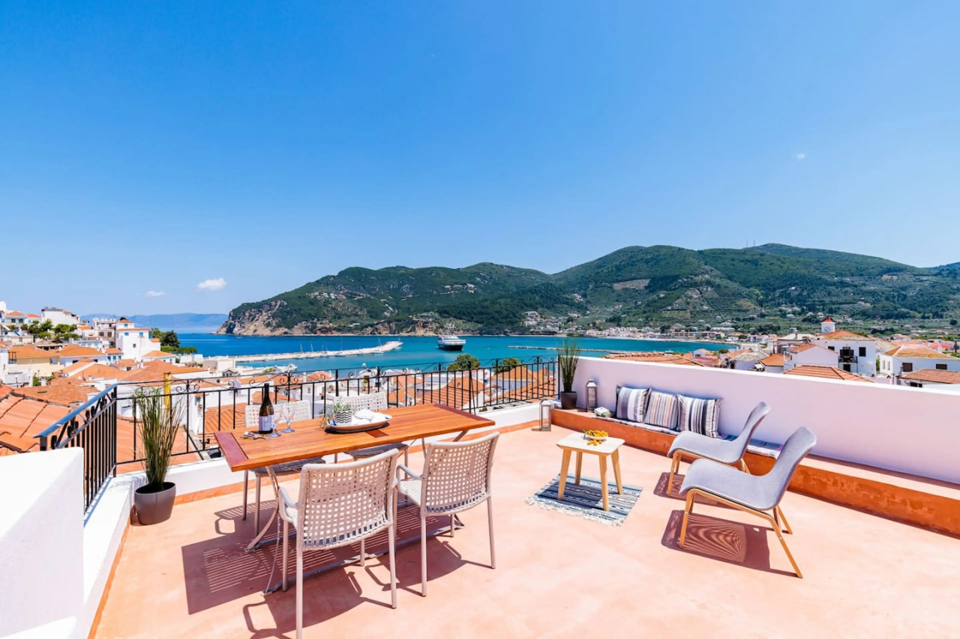 Rooftop terrace with panoramic view of the mountains and the sea
