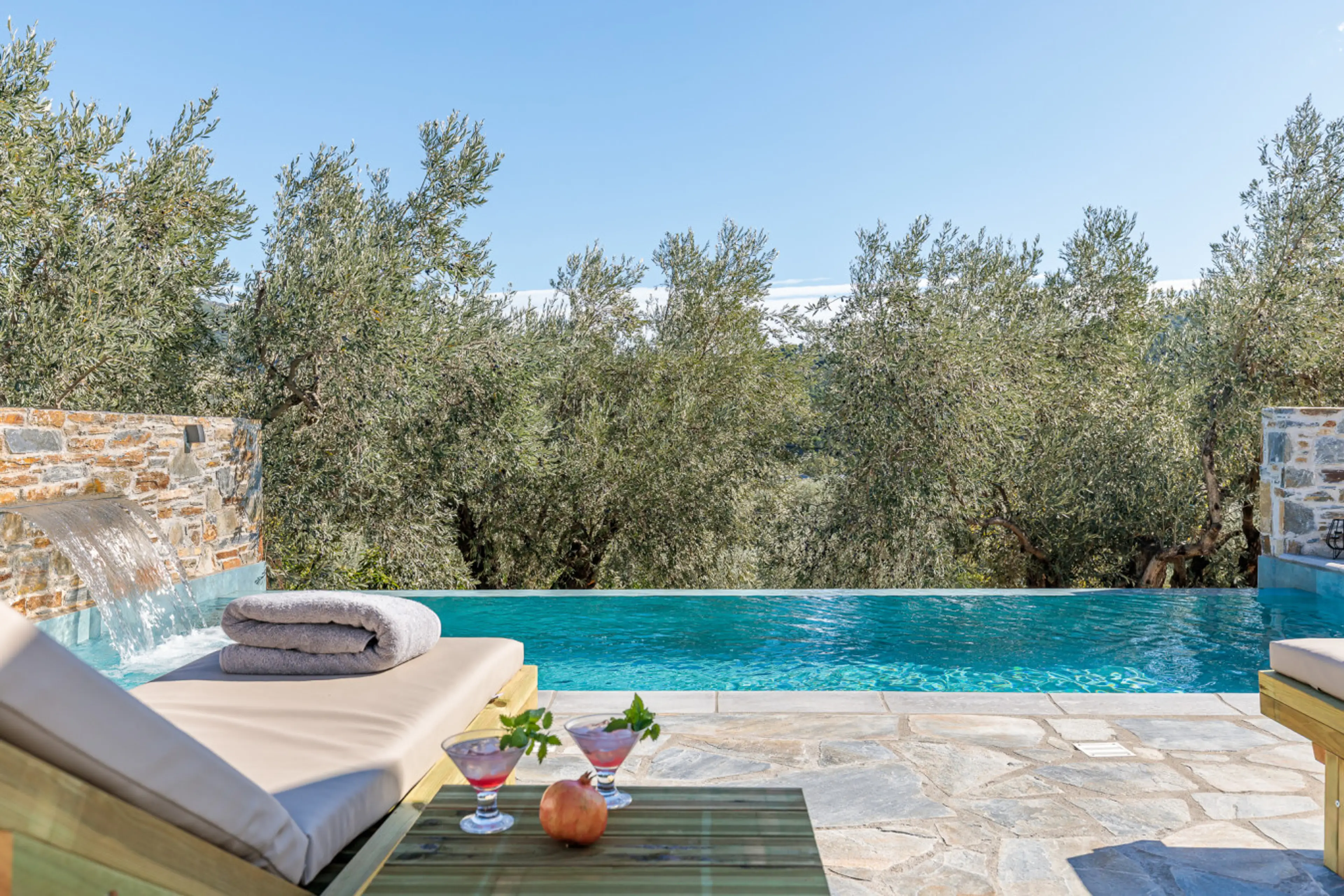 Infinity views over a private olive grove valley.