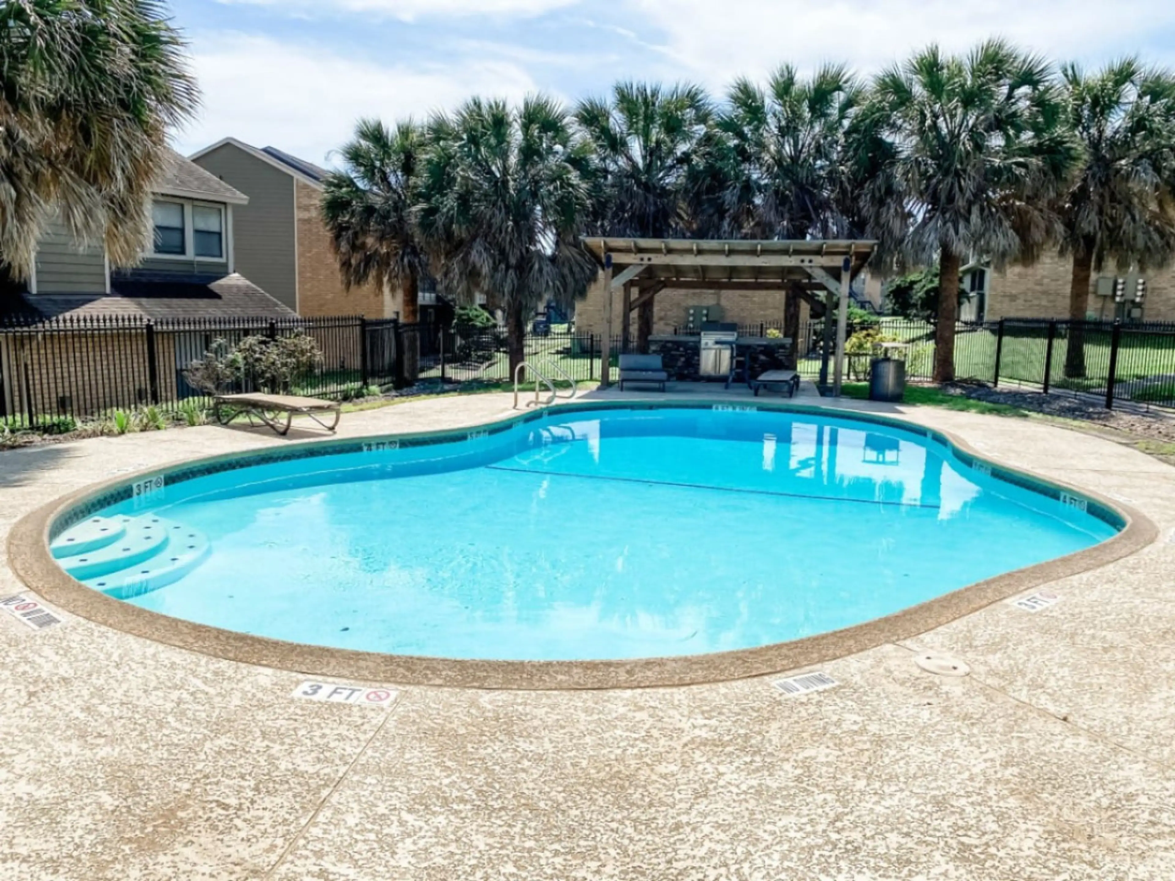 Splash in the sparkling swimming pool at the community clubhouse