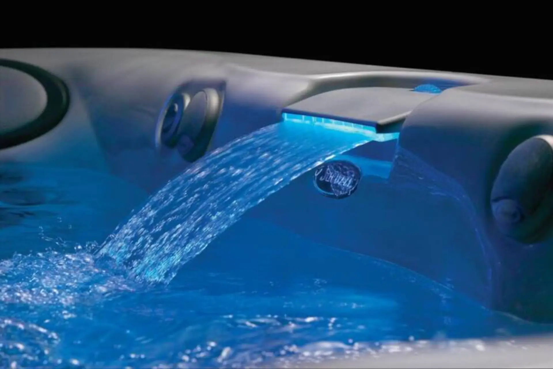 L.E.D. and waterfall make for a soothing night in the hot tub on the back deck.