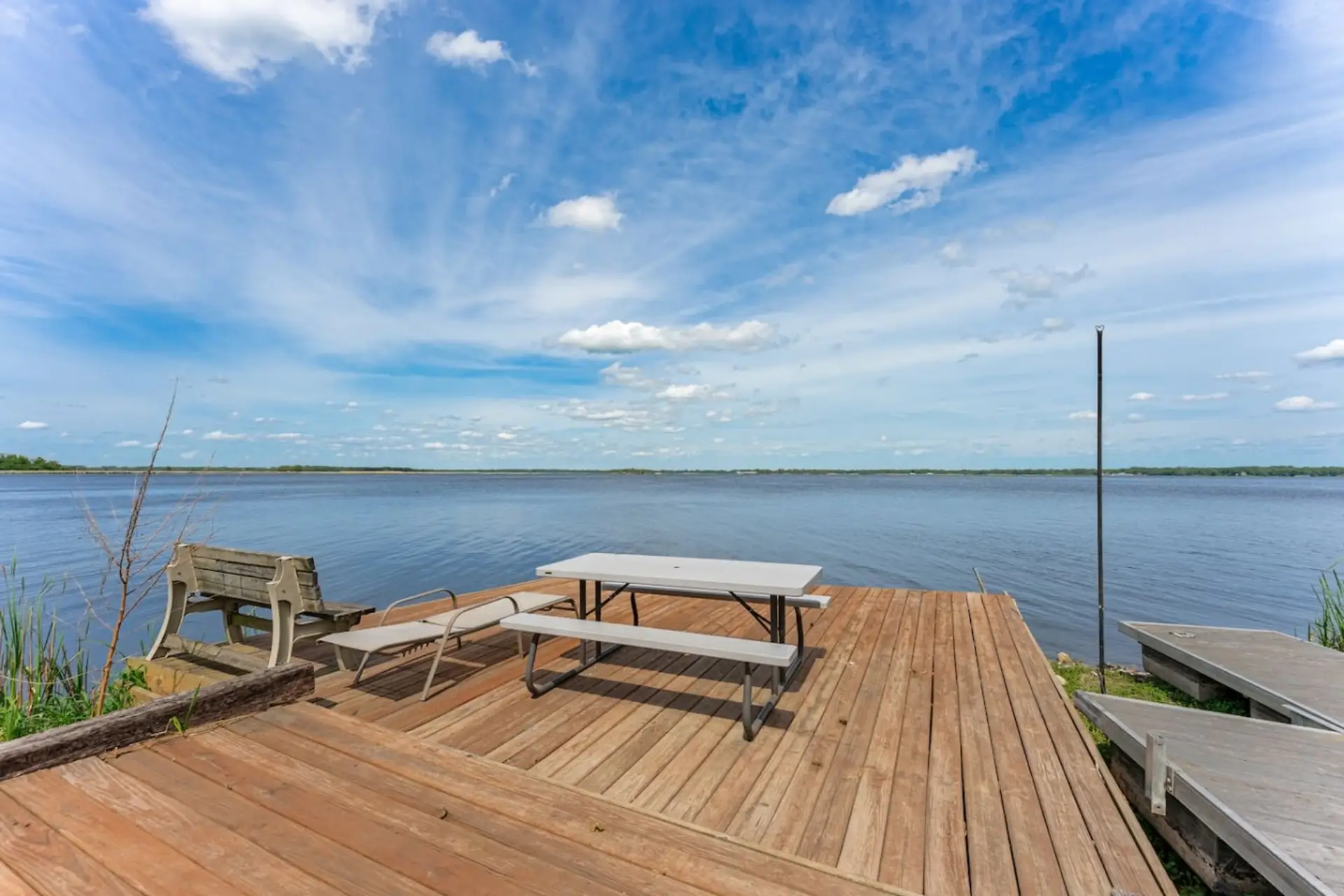 Enjoy Grass Lake Lake Views from the nature deck by the water
