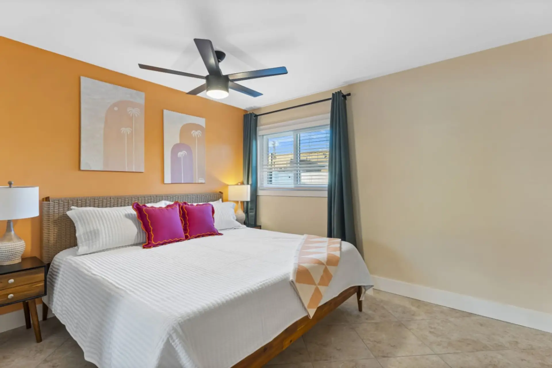 Cocoa Beach King Suite | Warm Coastal Retreat with Red Accents, Woven Details & Tropical Palm Art