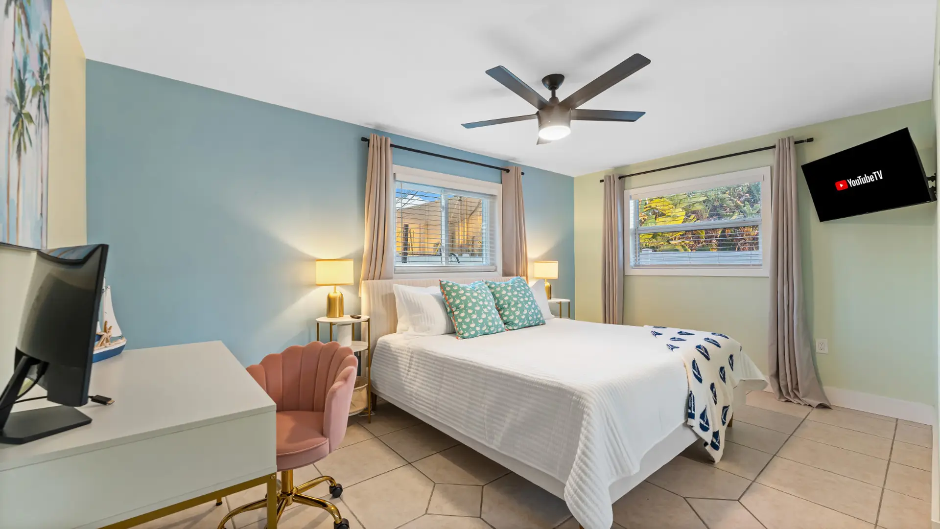 Cocoa Beach King Suite | Relaxed coastal haven with teal highlights, nautical workspace & breezy blue charm