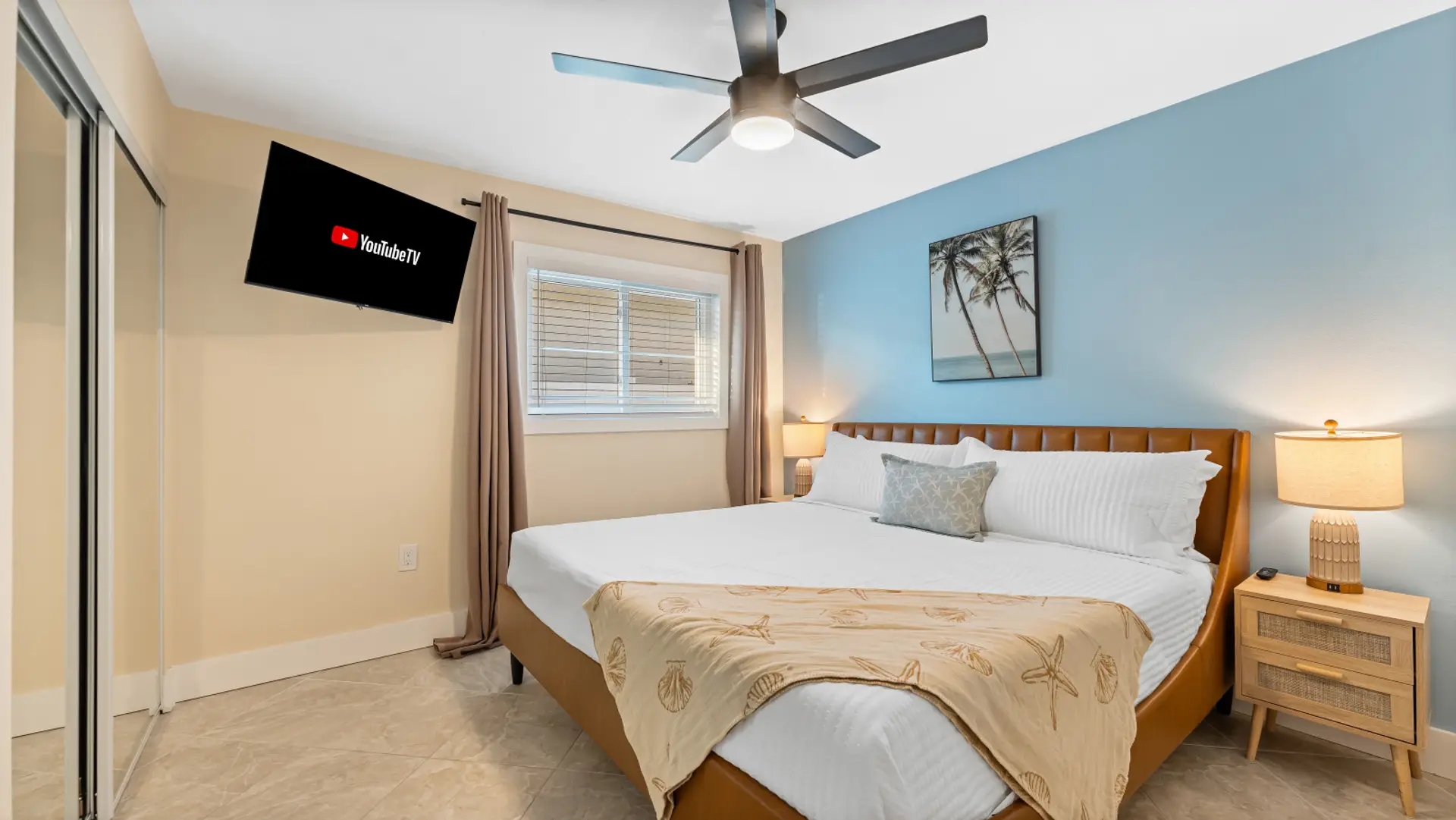 Cocoa Beach Bedroom | Airy Coastal Escape with Palm Artwork, Seashell Bedding & Sleek Mirrored Closet Doors