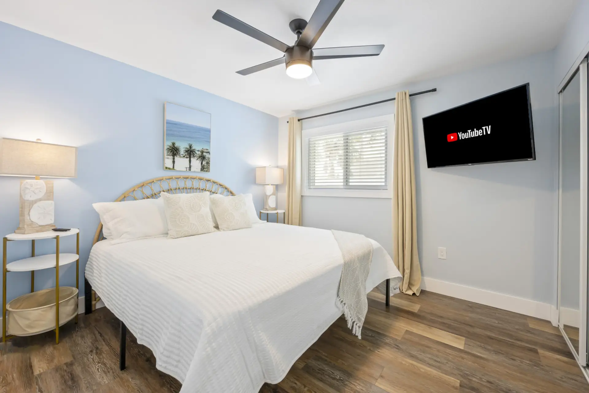Cocoa Beach Bedroom | Serene Blue Hues, Beach Artwork & Wall TV for Restful Coastal Ease