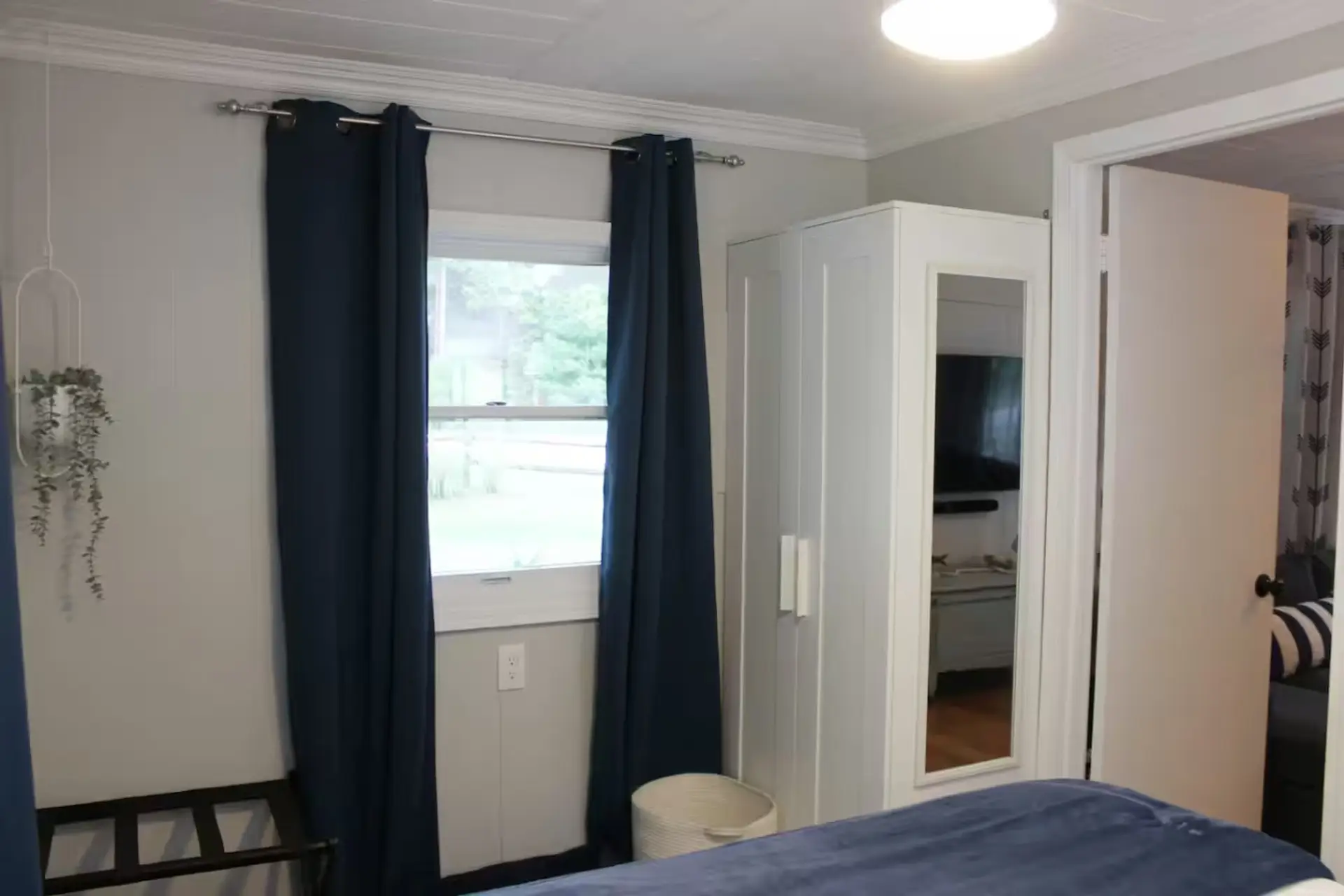 Bedroom 1 - Armoire for clothing storage. Beach towels located inside for use during your stay