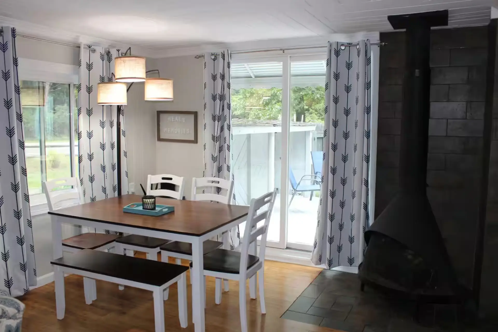 Dining Room table with seating for 6 to enjoy your family meal time. Plenty of natural light and sliding glass door to the deck and side yard