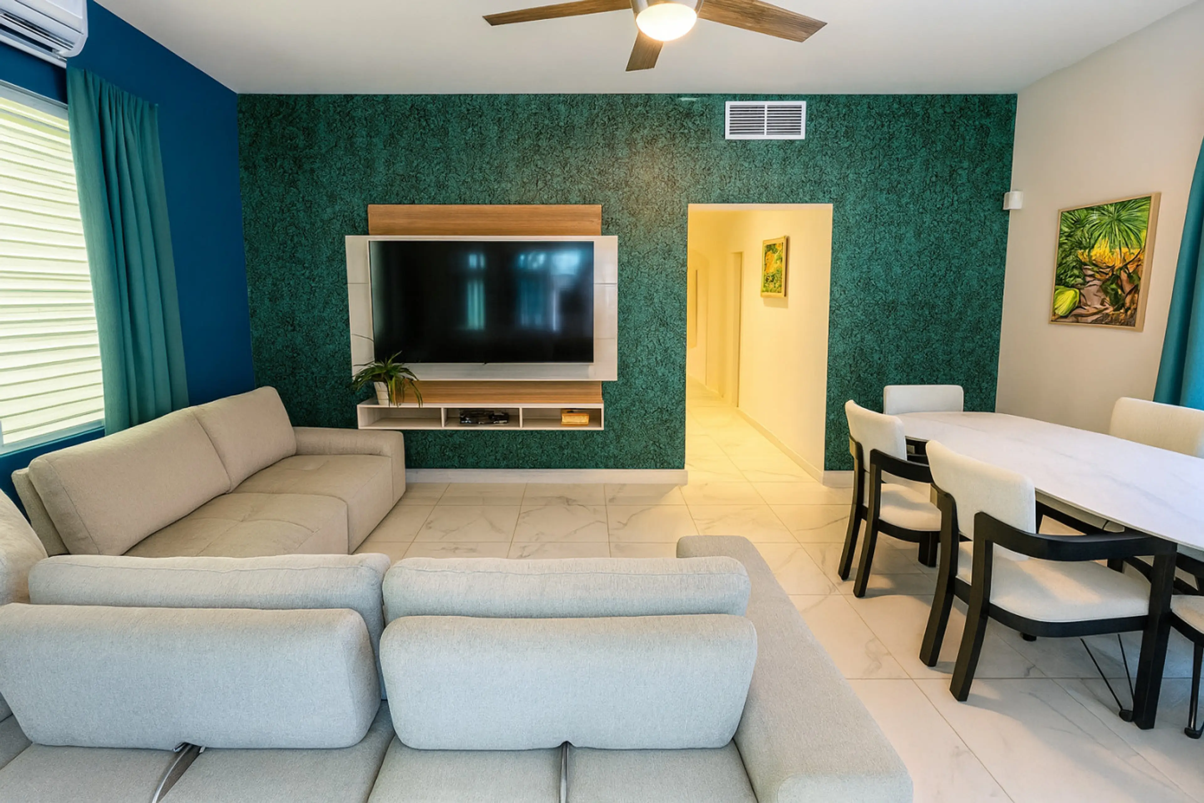 Contemporary comfort meets elegant dining in this stylish open space.