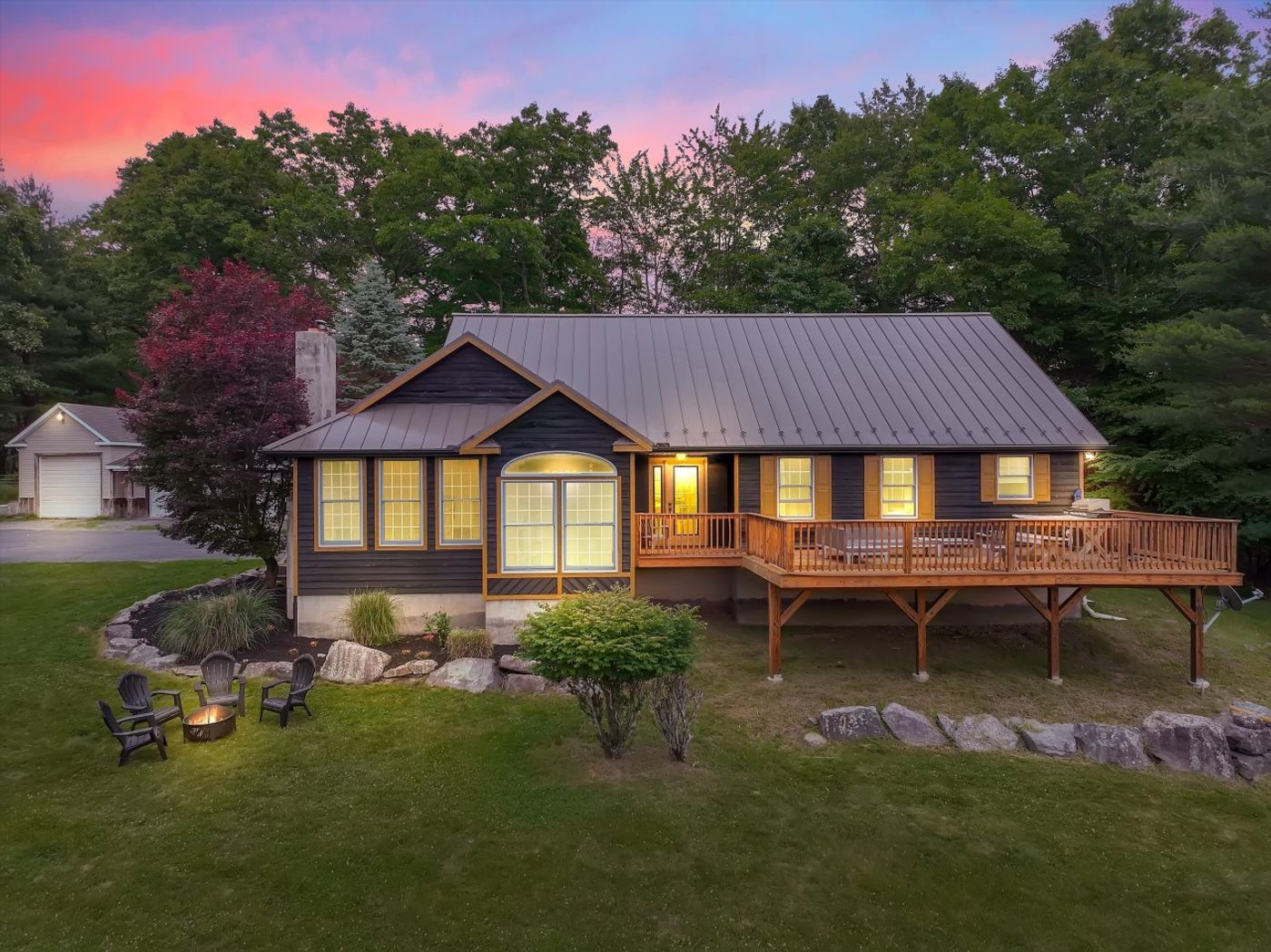 One of the six houses with its deck at sunset