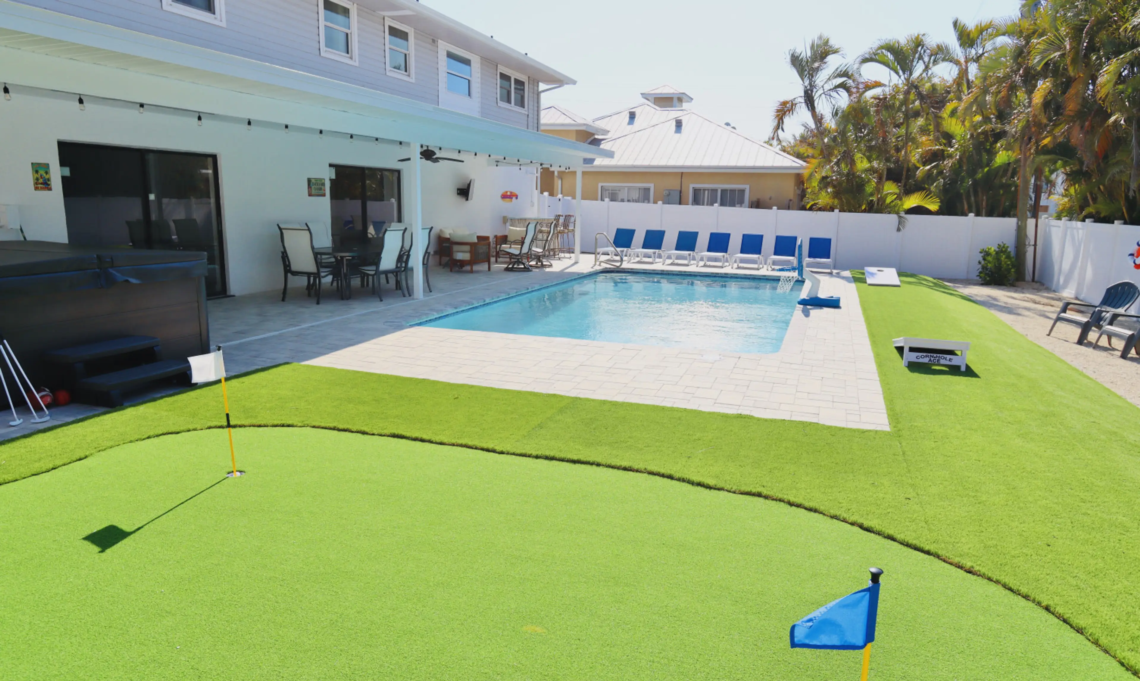 Pool, Cornhole, & Putting Green