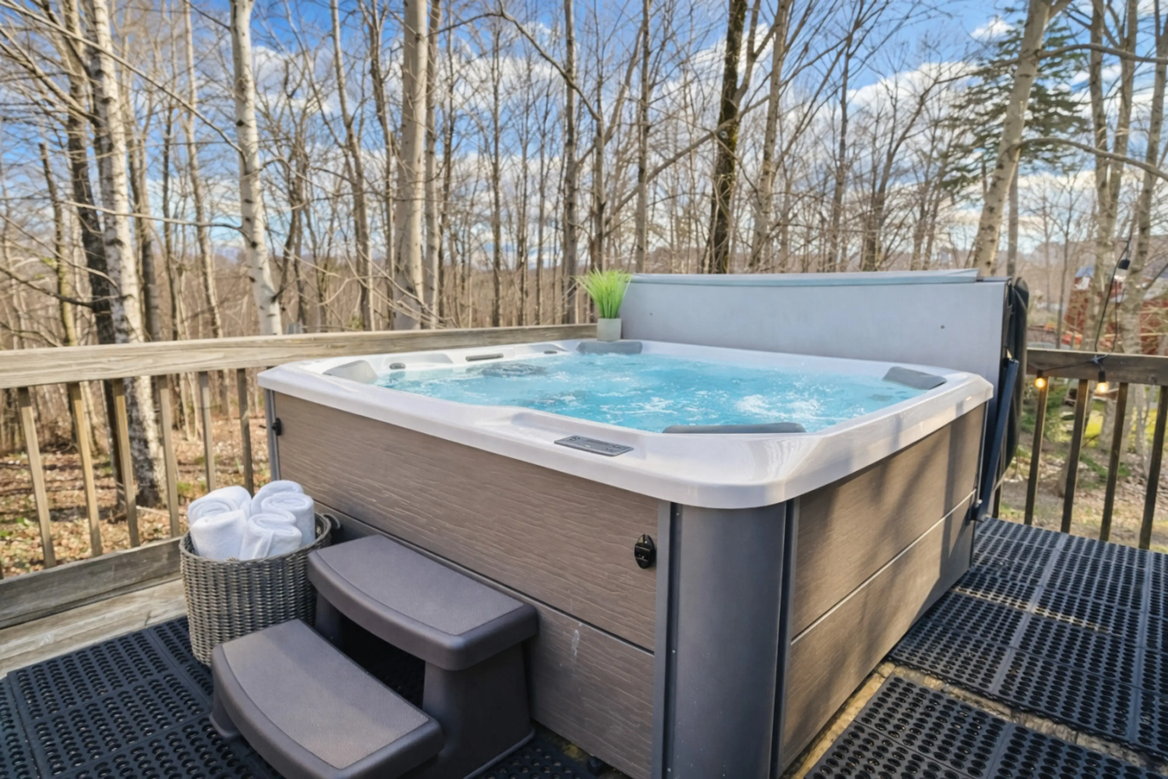 Soak in the hot tub with mountain views.