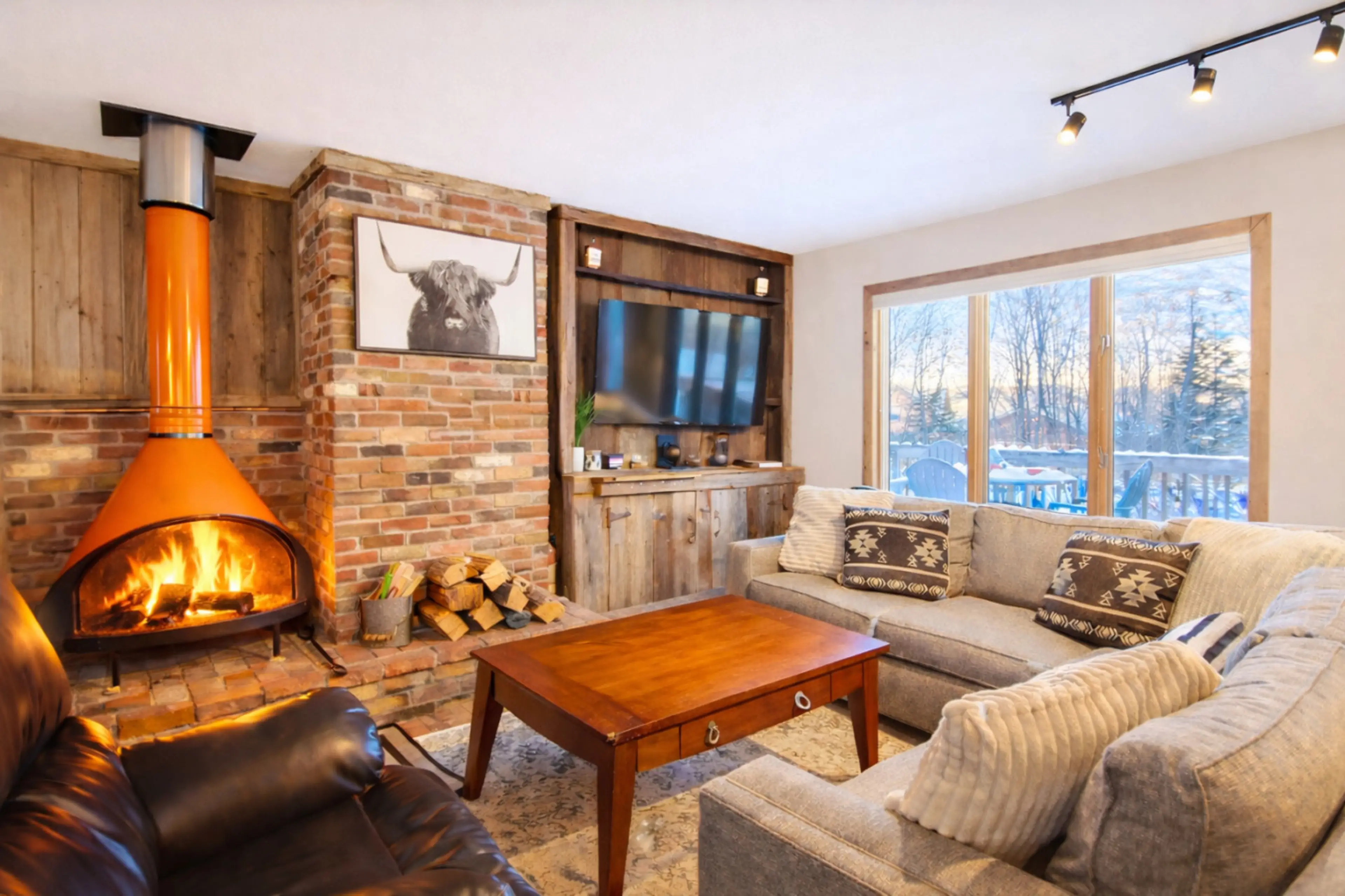 Cozy up by the wood-burning fireplace for quality time with loved ones. Wood costs $12 per bundle