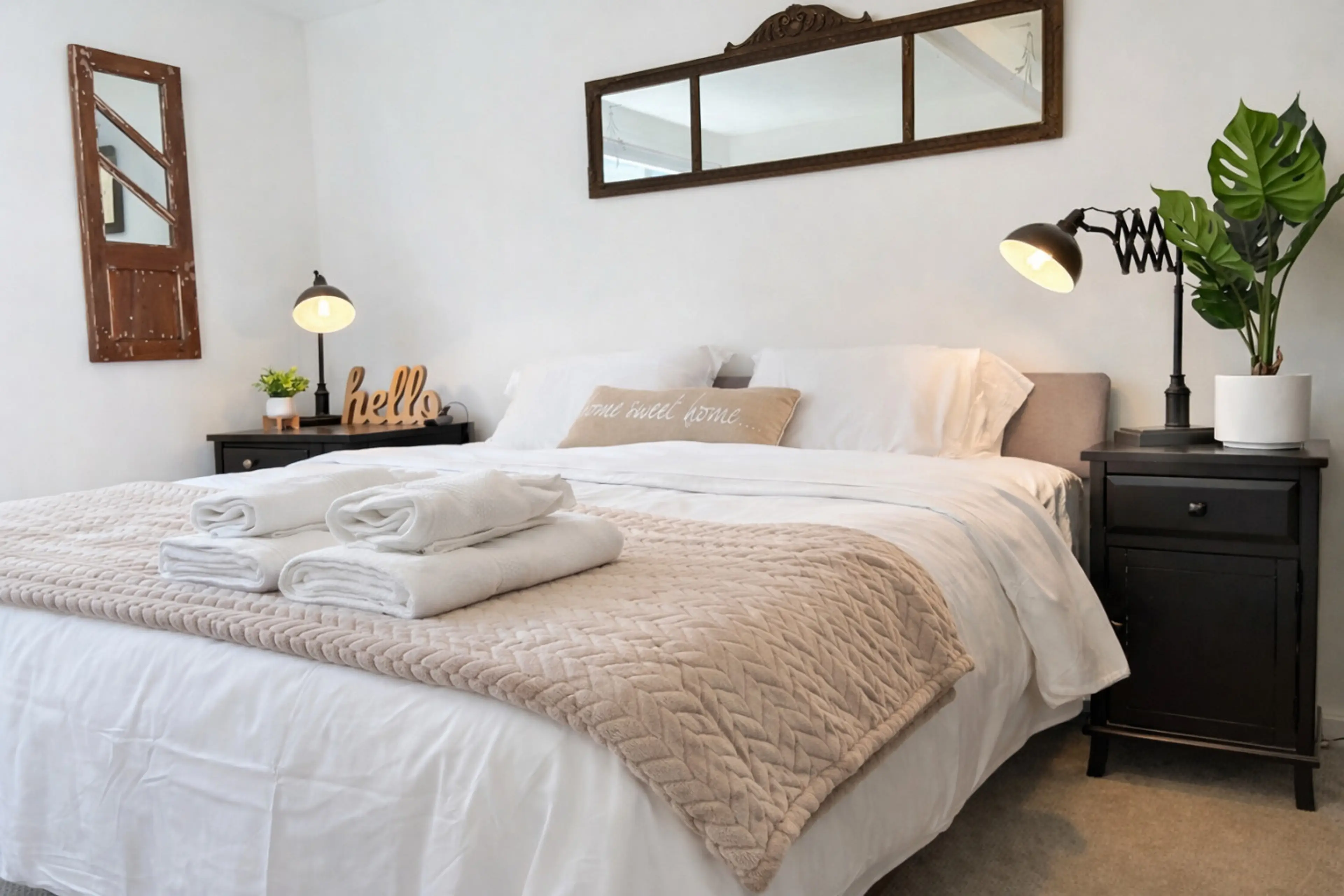 Relax in our king bed with new mattress and luxury linens for a cozy night's sleep in style.