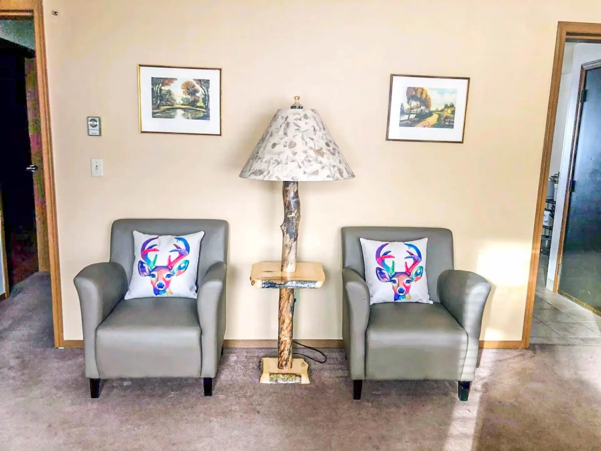 Additional armchairs in the living room.