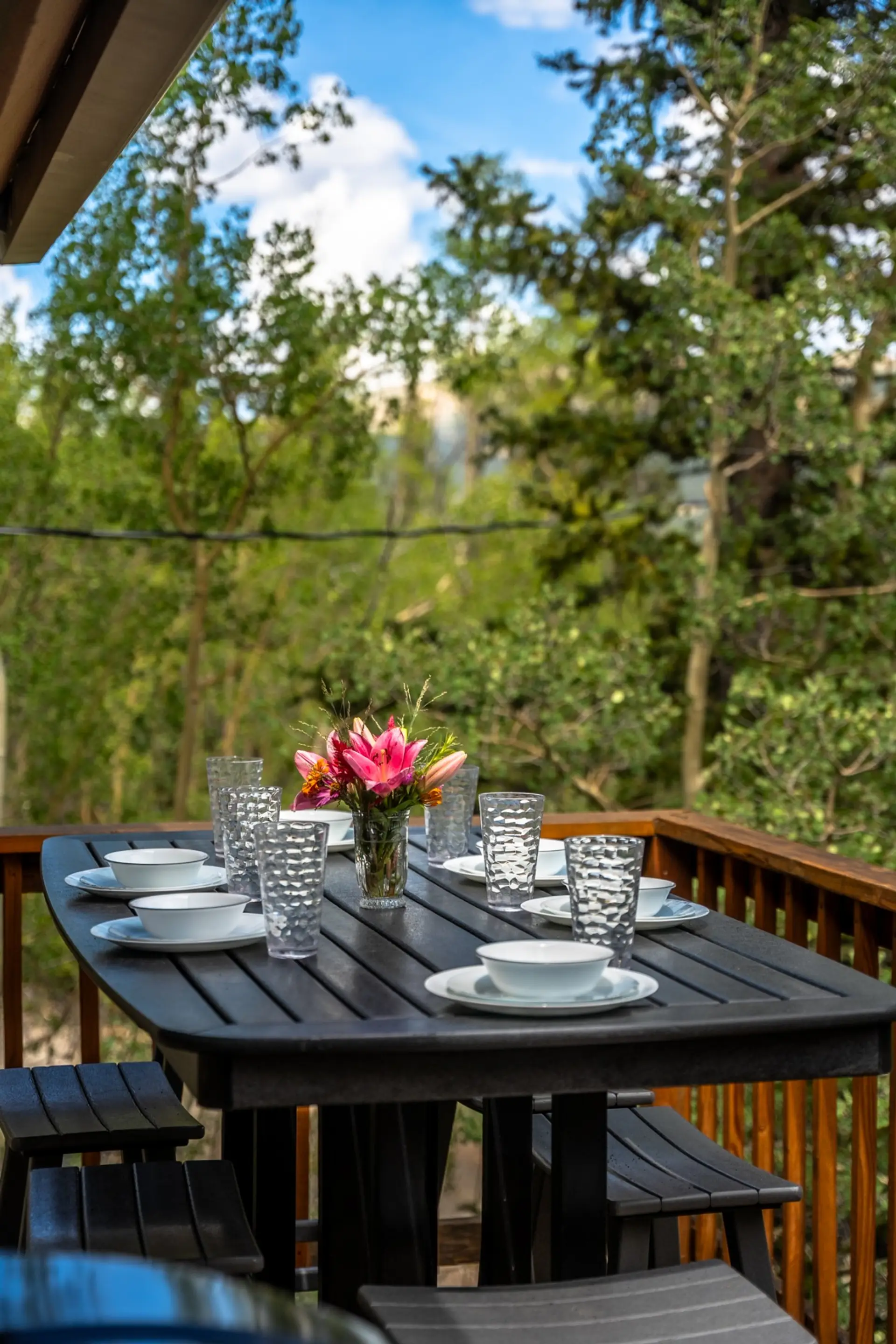 Wide open deck space for lounging, dining, or just soaking in the Rockies.