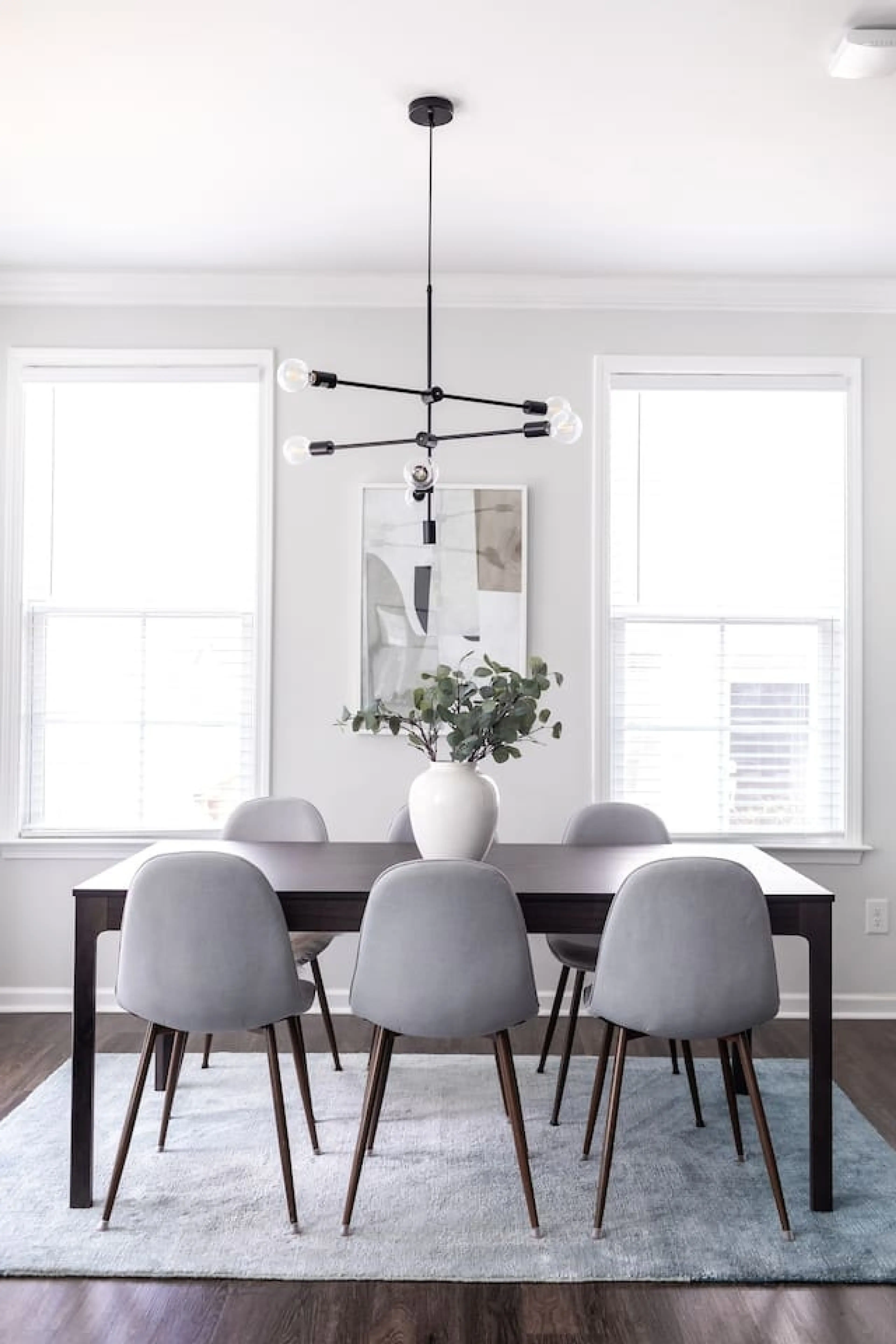 Dining room table comfortably seats 6 and has an extension that allows for 8-10 guests.(Cary, North Carolina executive furnished rental)