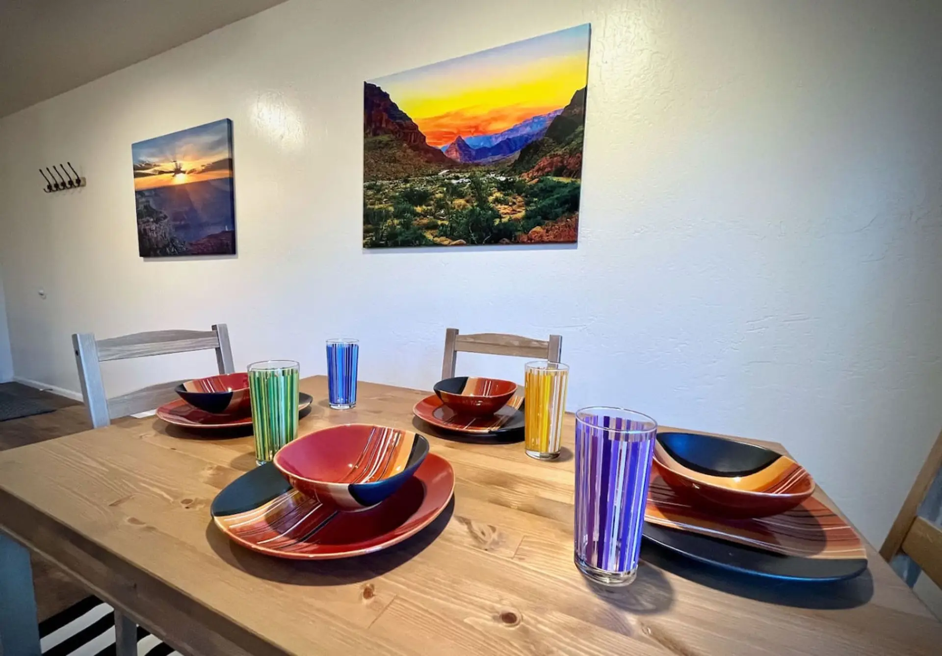 Dining table set for shared meals, morning coffee, or planning the next day’s adventure.