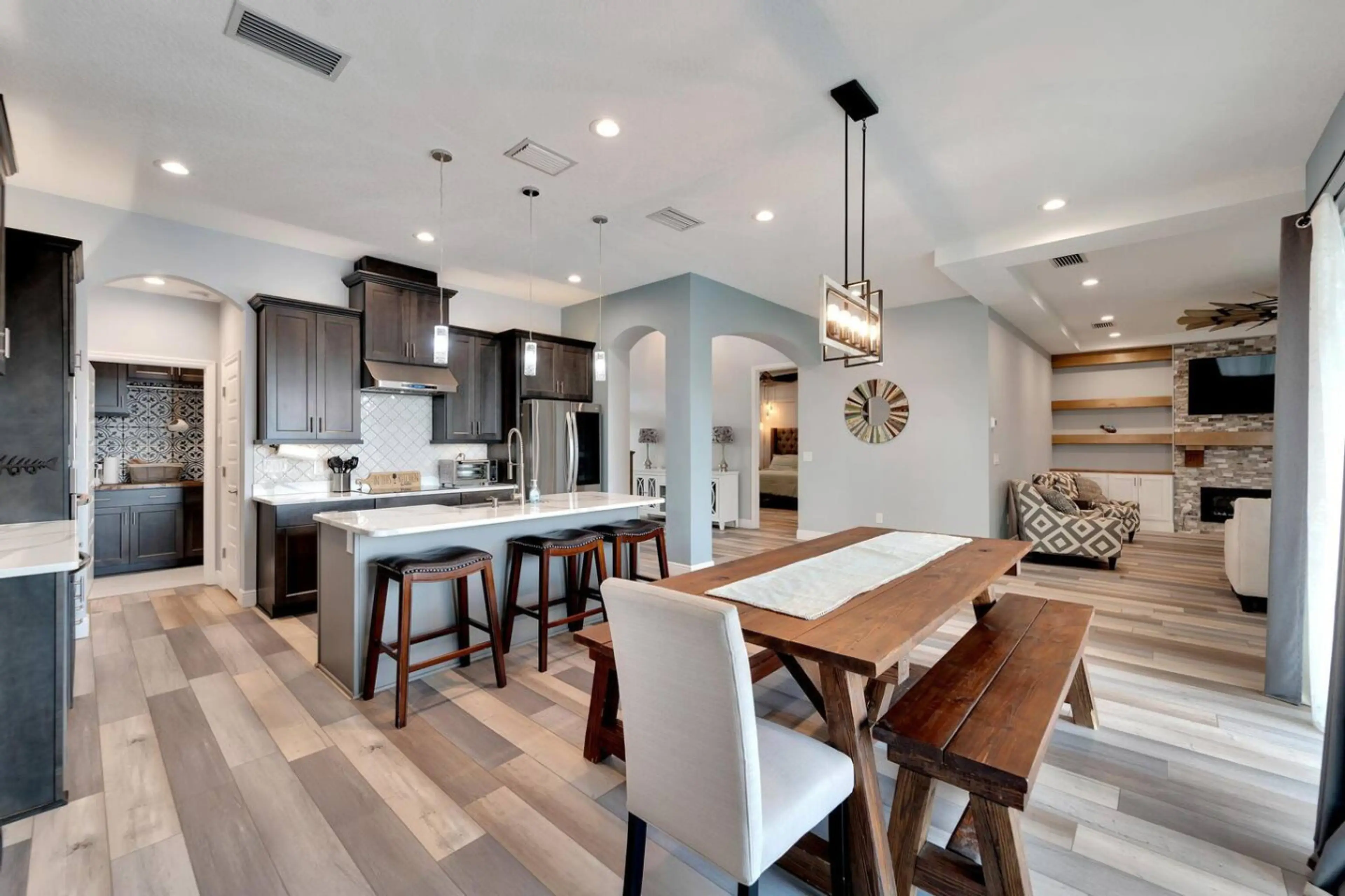 Open concept kitchen stocked with modern amenities