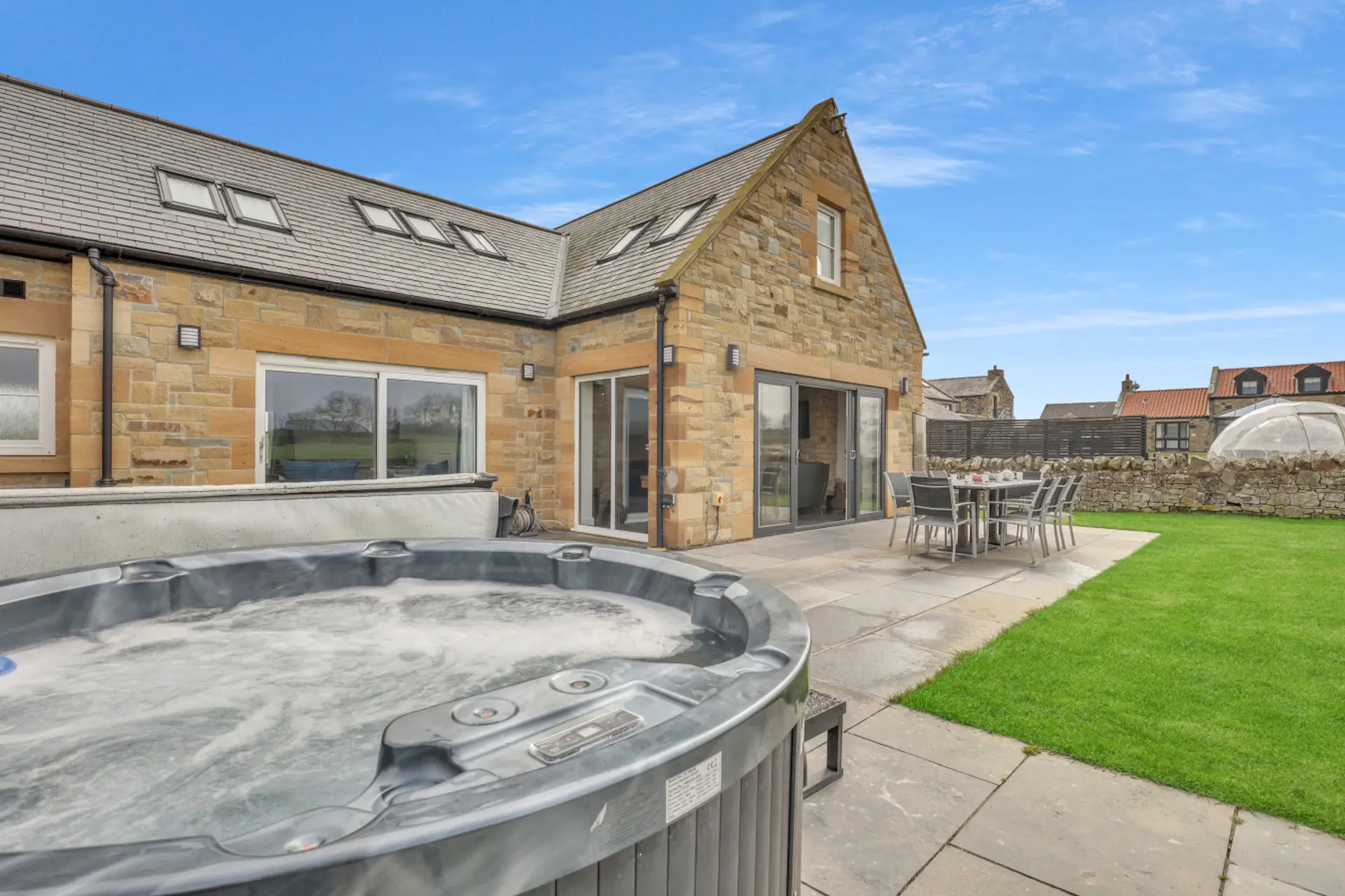 Private hot tub and enclosed garden with countryside views