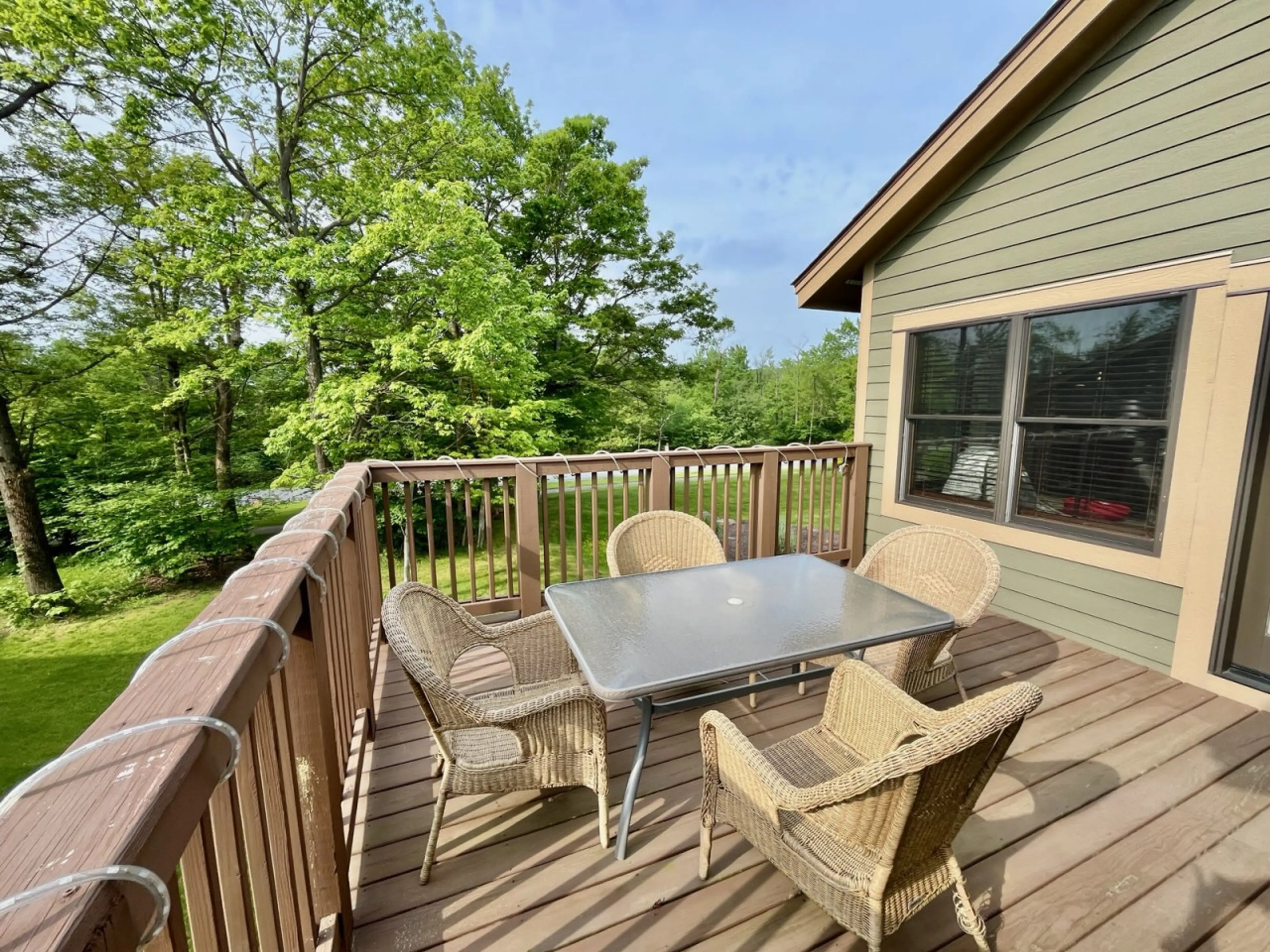 Enjoy drinks and dinner on the back deck overlooking the back yard