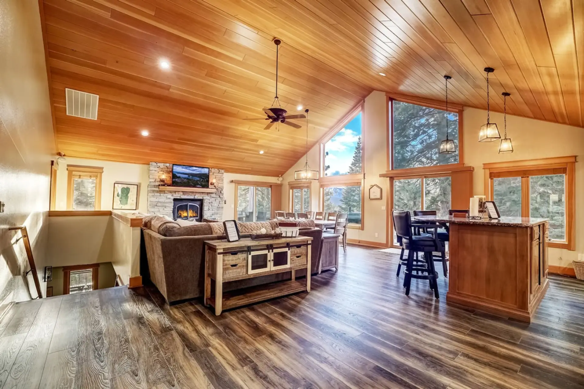 Living room w/ gas fireplace and smart TV.