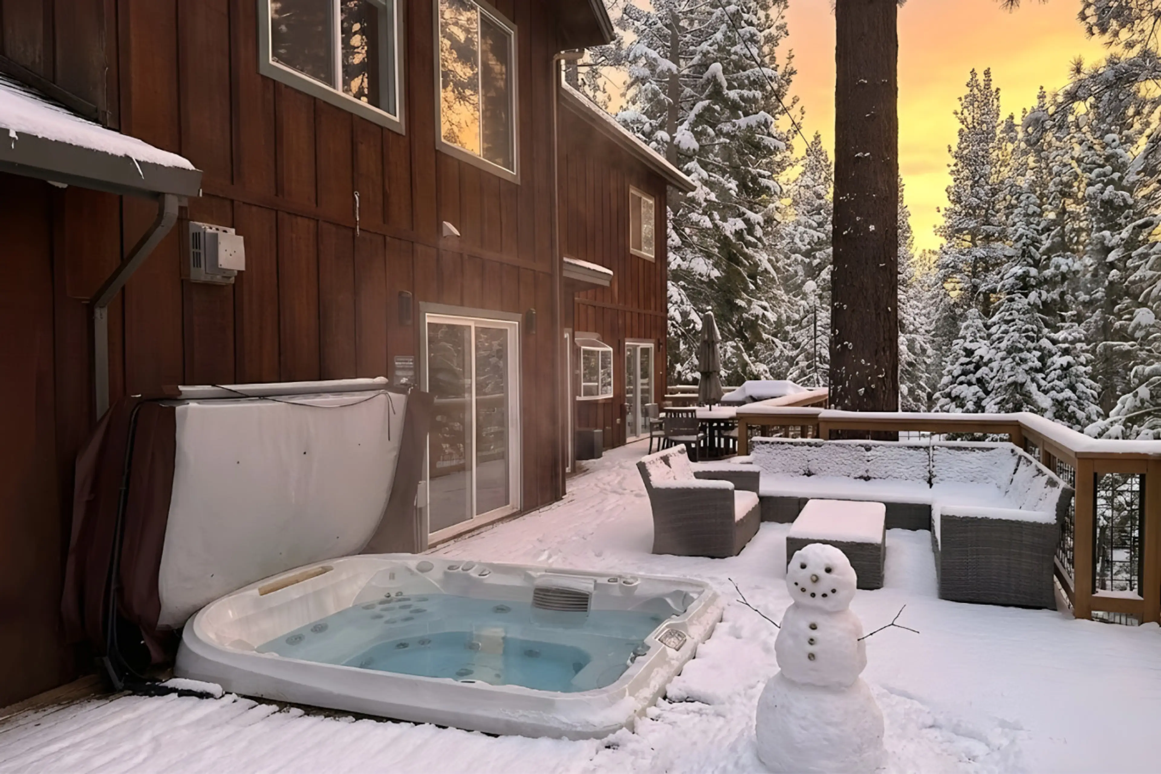 Back deck with hot tub.