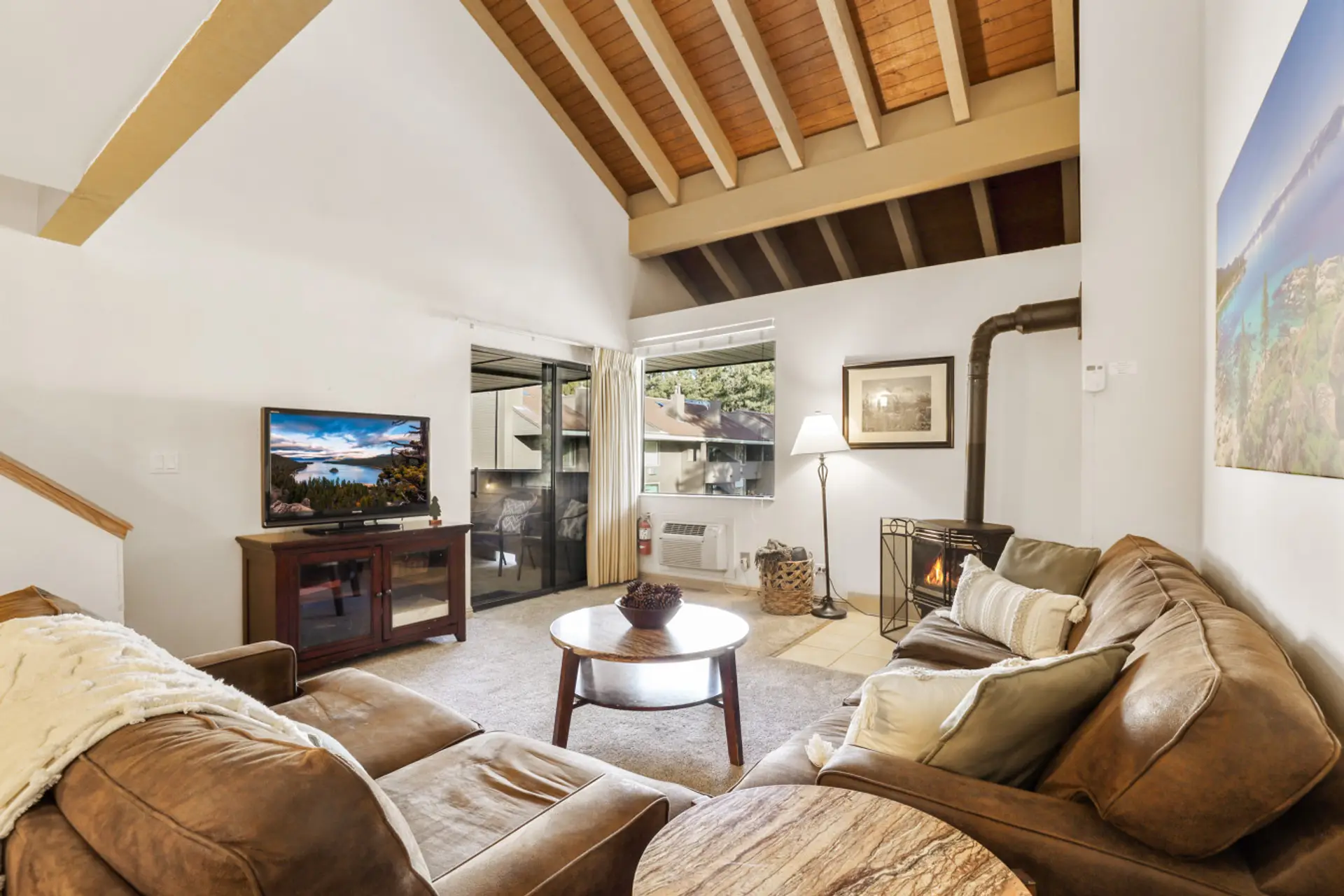 Living room with Smart TV & gas fireplace